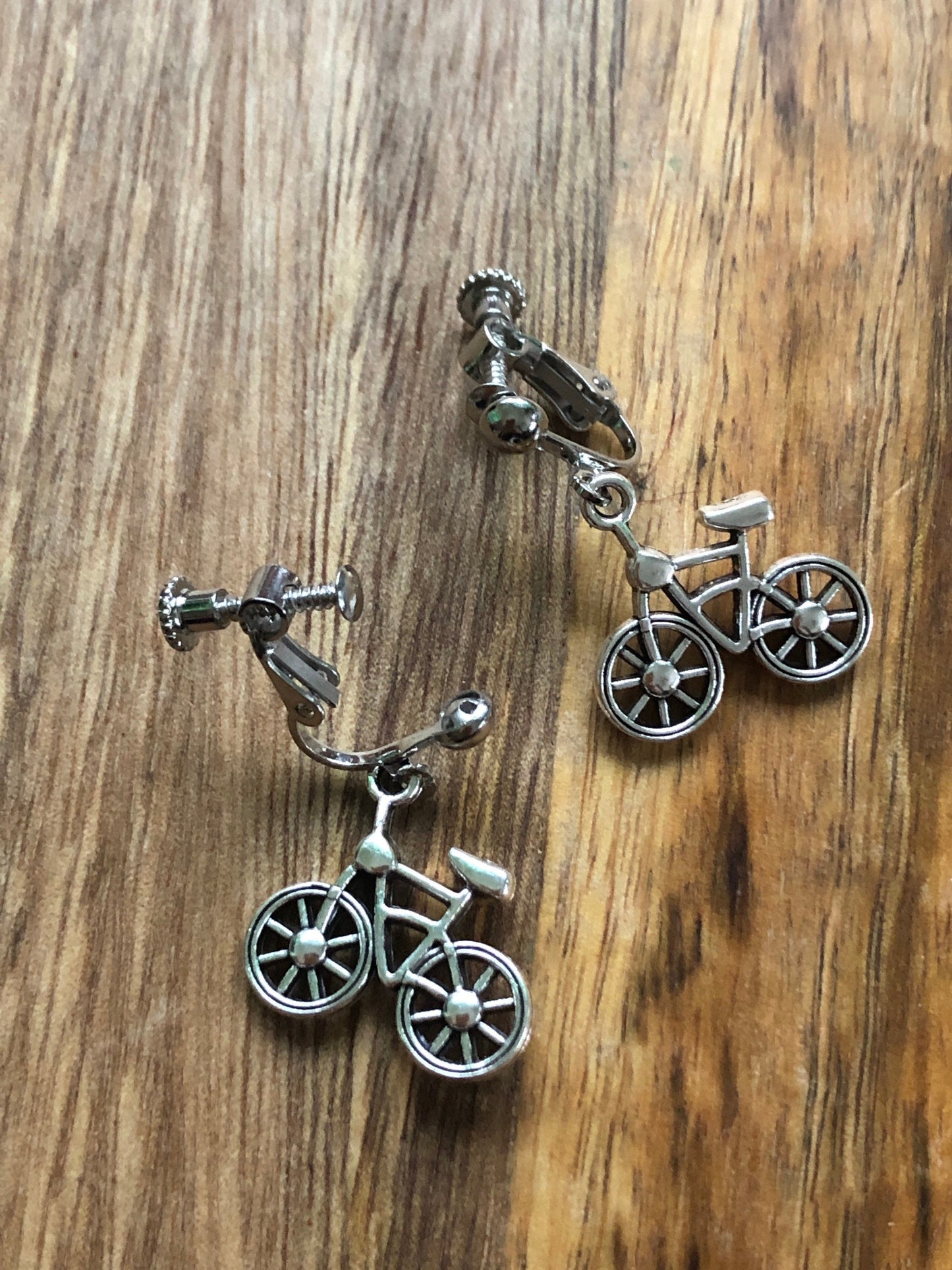 Dangling bicycle clip on earrings (no pierce | screw back)