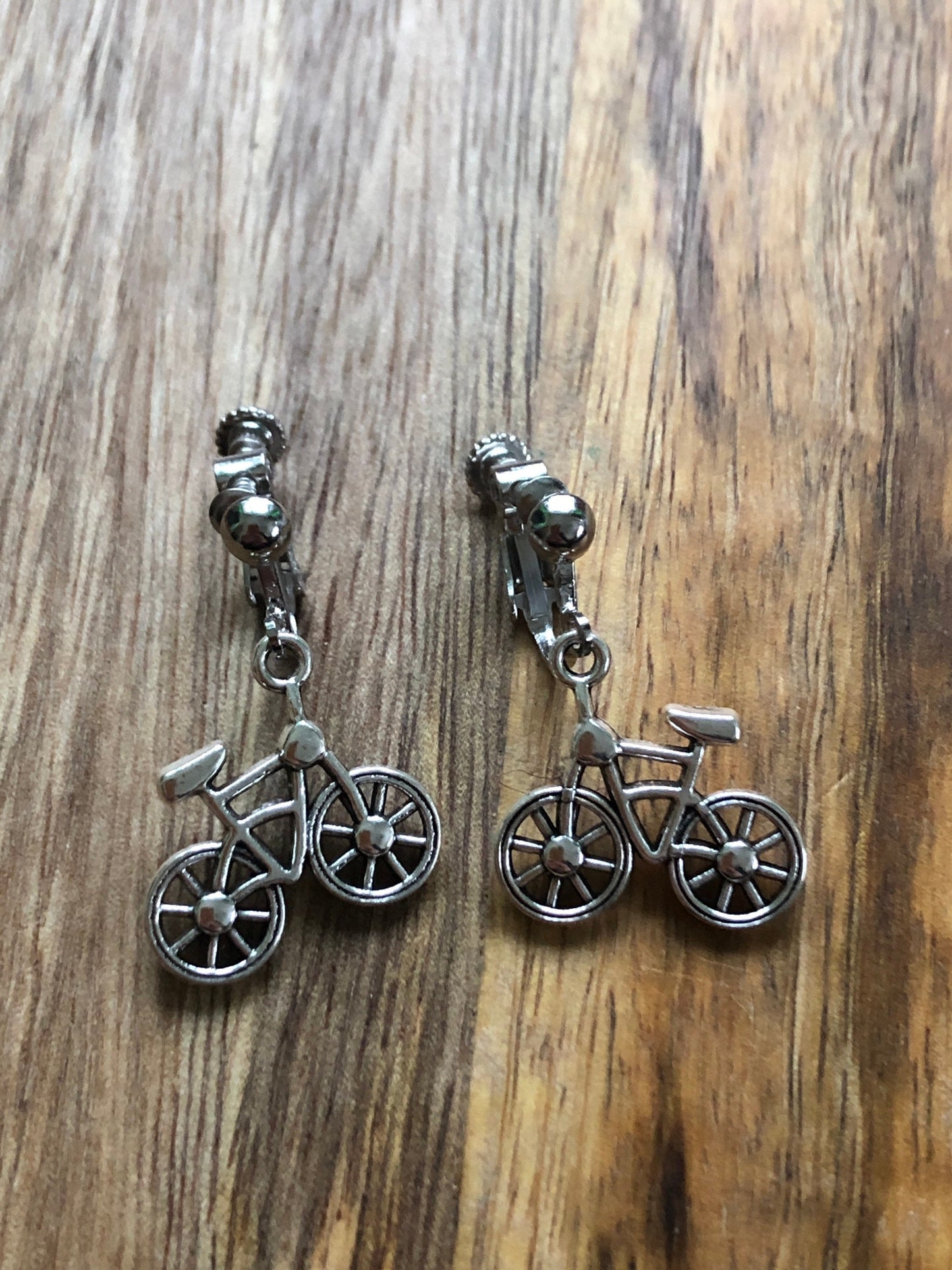 Dangling bicycle clip on earrings (no pierce | screw back)