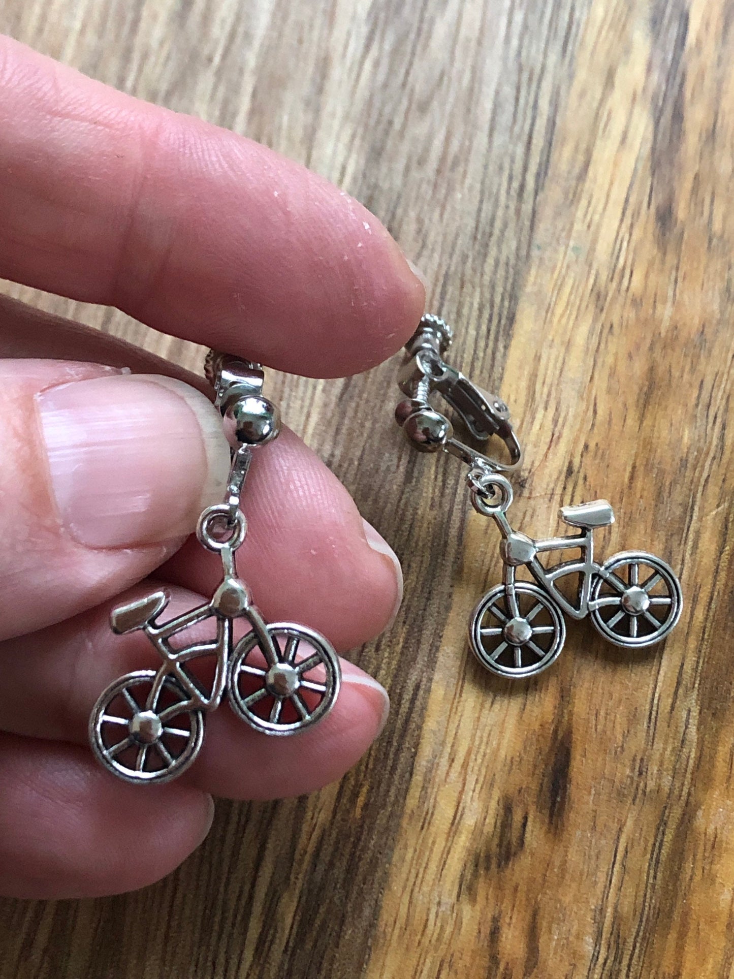 Dangling bicycle clip on earrings (no pierce | screw back)