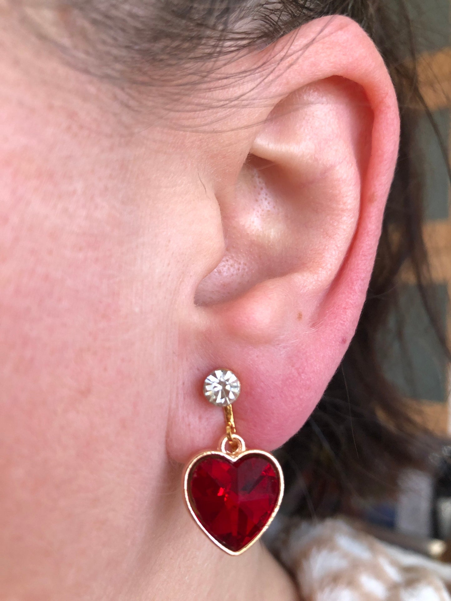 Clip on rhinestone heart earrings, dangling heart earrings with hinged screwback closures.