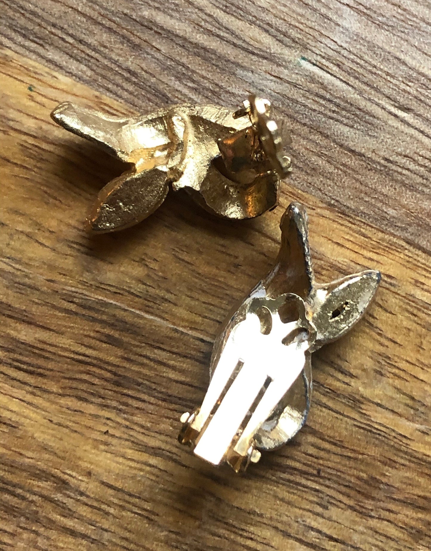 Vintage gold and rhinestone flame clip on earrings.