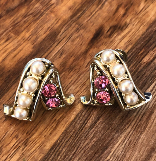 Pink rhinestone clip on earrings with faux pearl accents