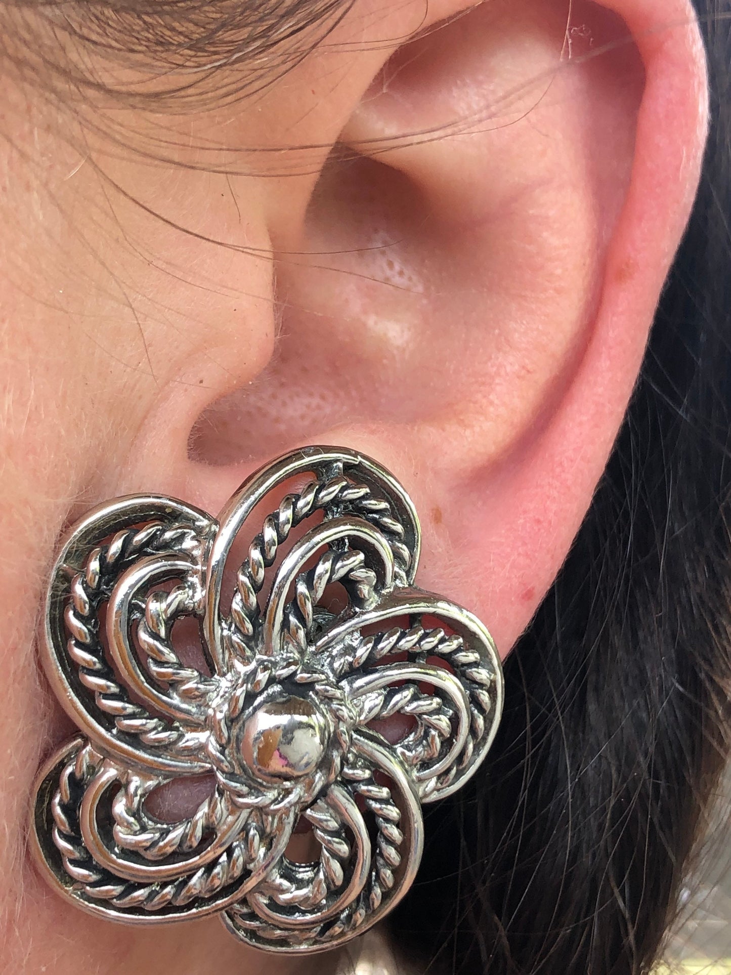 Vintage Avon silver flower clip on earrings