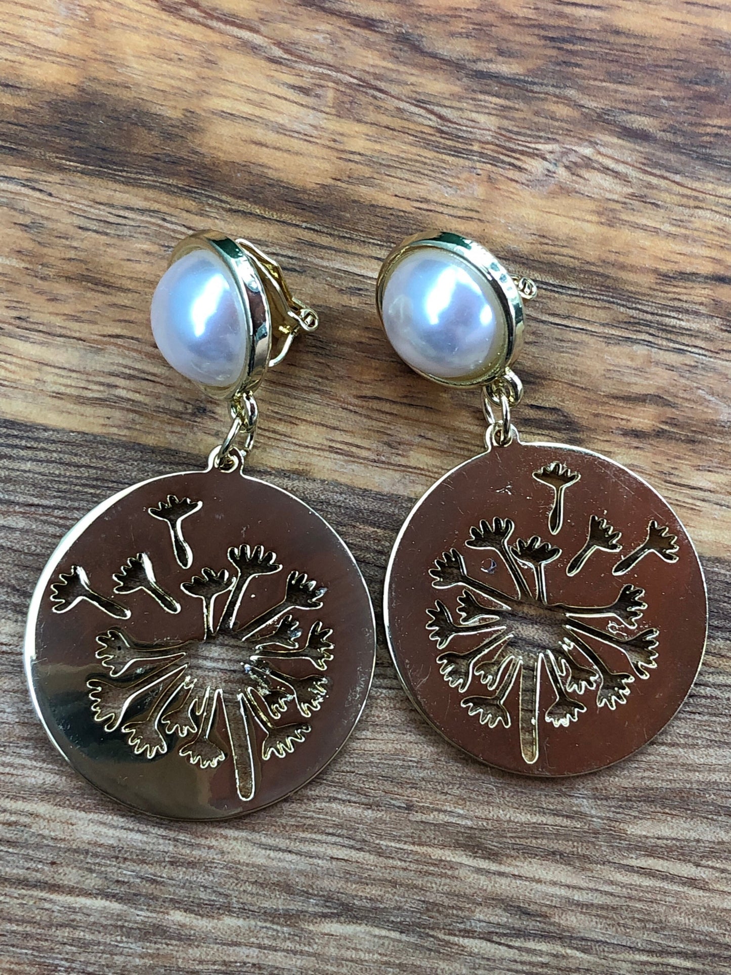 dangling dandelion clip on earrings