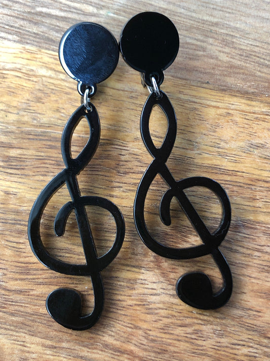 large dangling treble clef clip on earrings