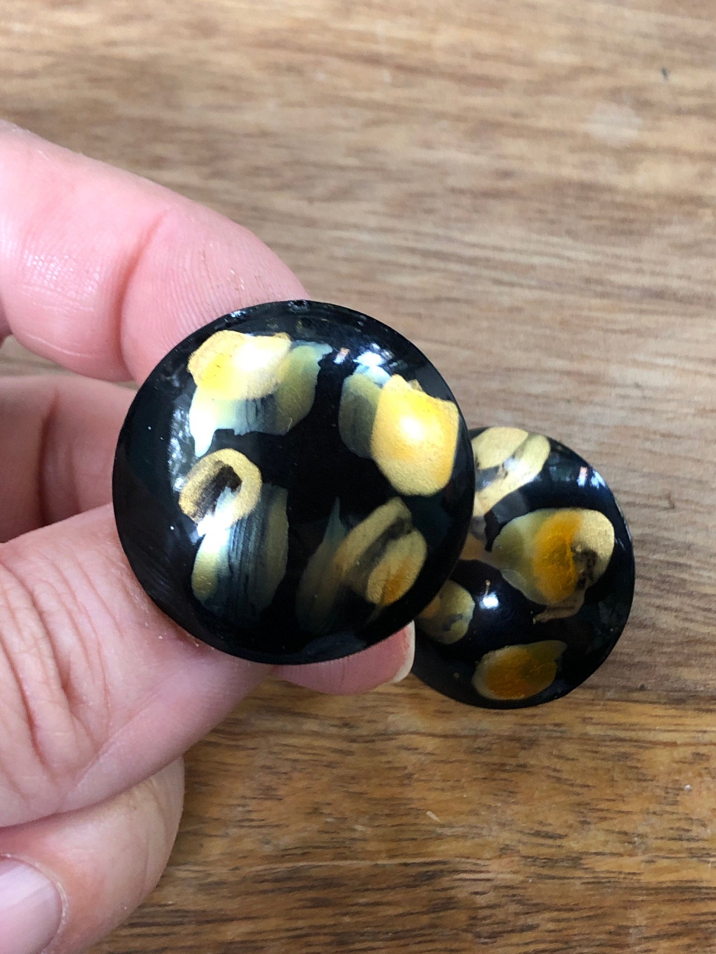 Vintage 80s black and gold clip on button earrings