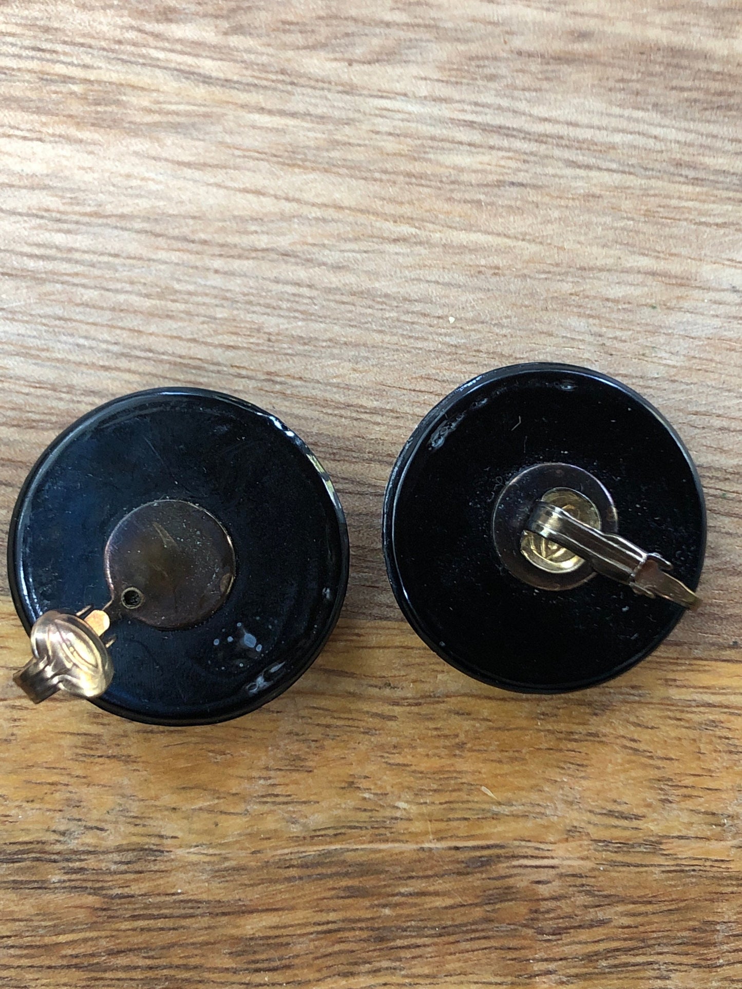 Vintage 80s black and gold clip on button earrings