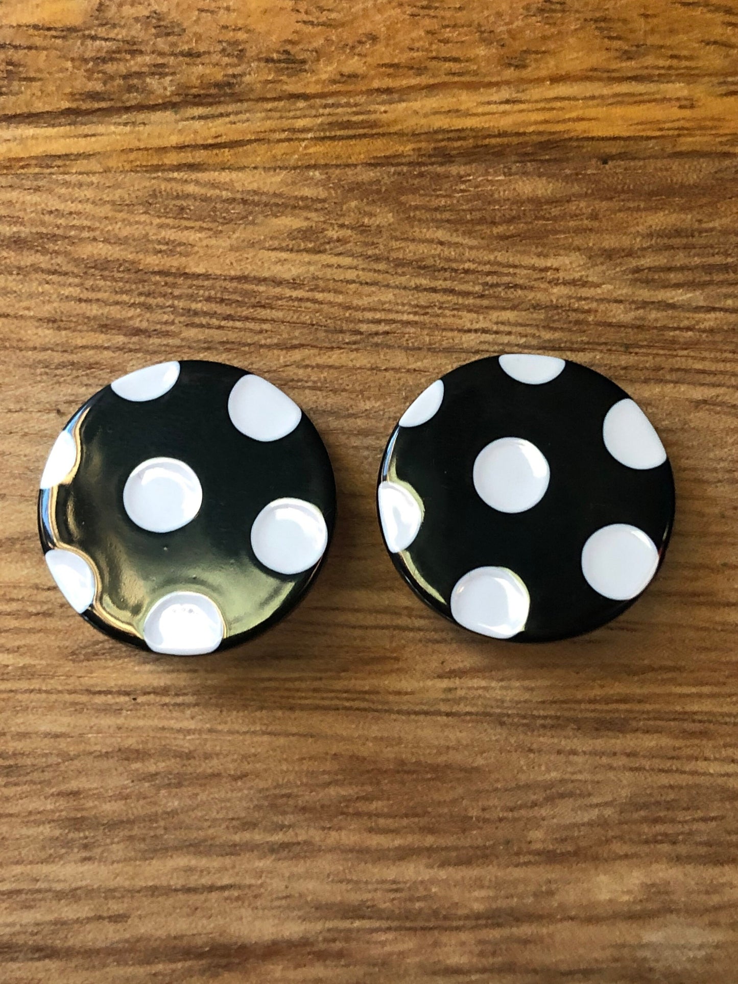 black and white polka-dot clip on earrings