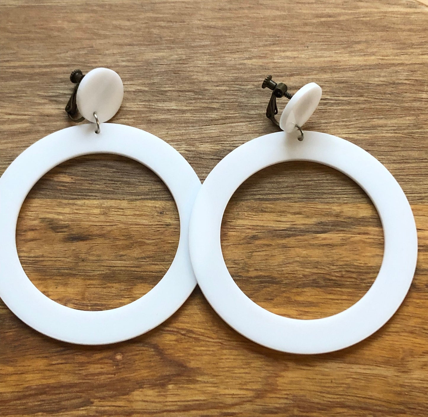 Giant plastic hoop clip on earrings (hinged screw on closures or clip closures)