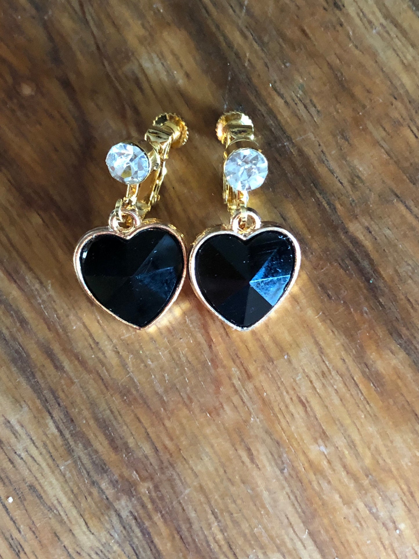 Clip on rhinestone heart earrings, dangling heart earrings with hinged screwback closures.