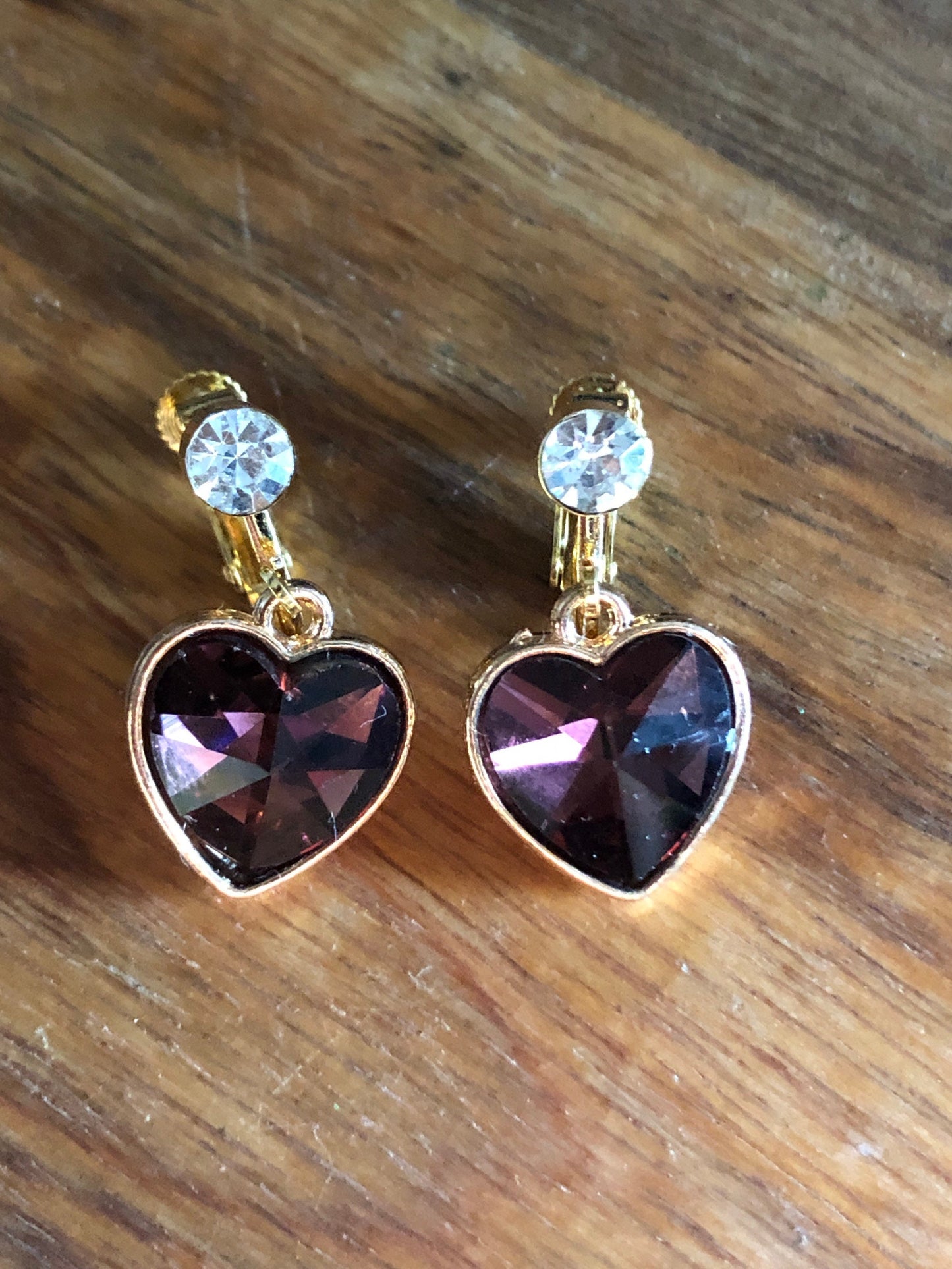 Clip on rhinestone heart earrings, dangling heart earrings with hinged screwback closures.