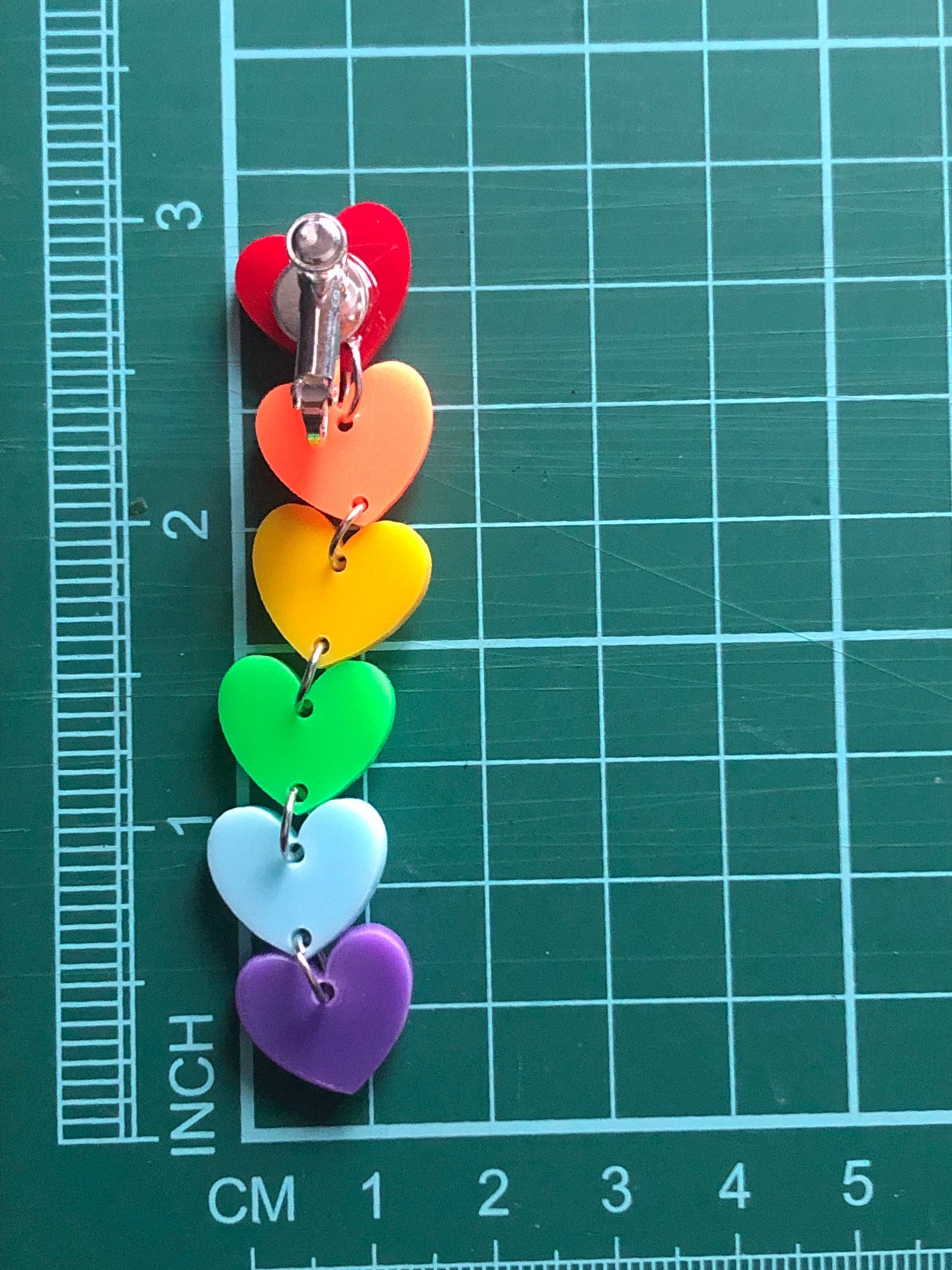 Dangling clip on rainbow heart earrings, pride earrings, fun earrings