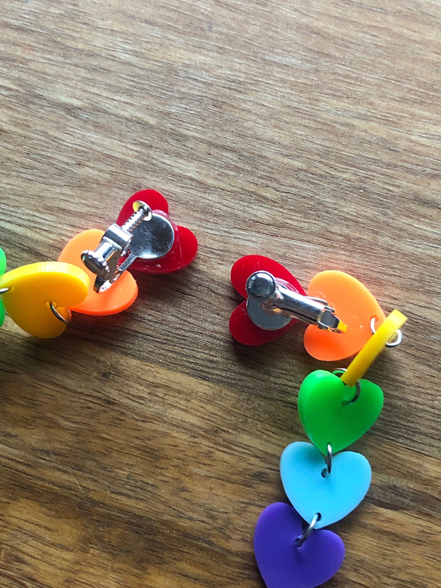 Dangling clip on rainbow heart earrings, pride earrings, fun earrings