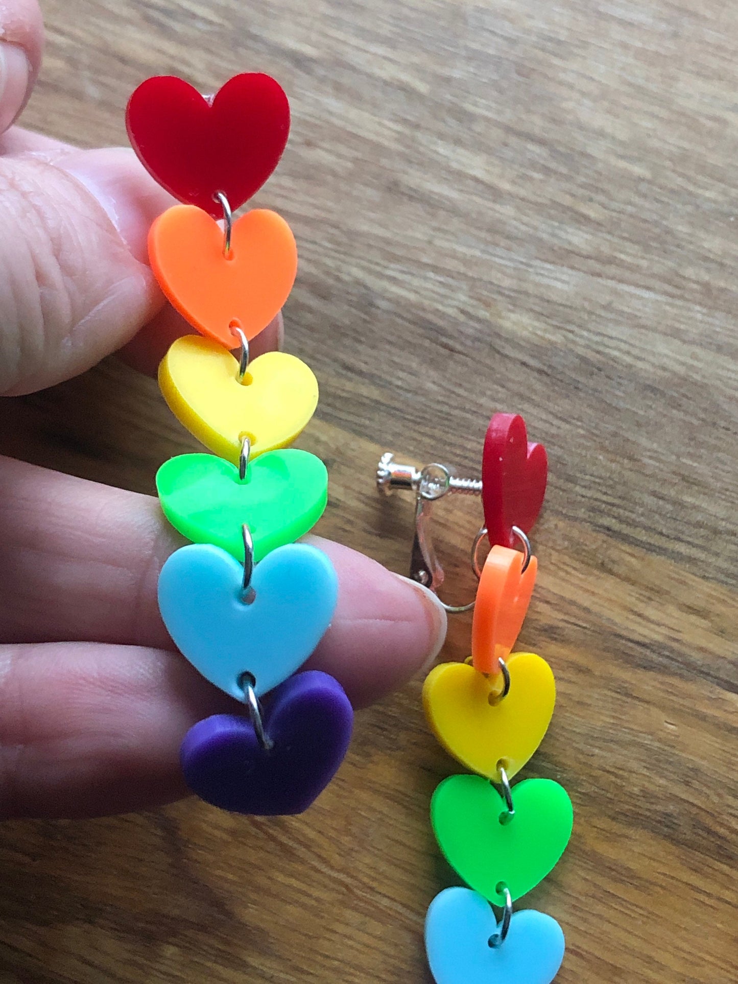 Dangling clip on rainbow heart earrings, pride earrings, fun earrings