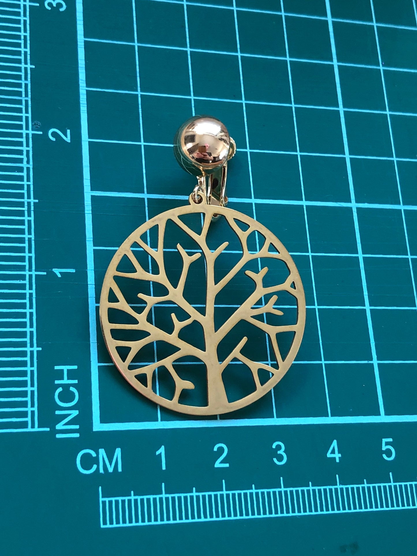 Dangling gold tree of life clip on earrings (screwback)