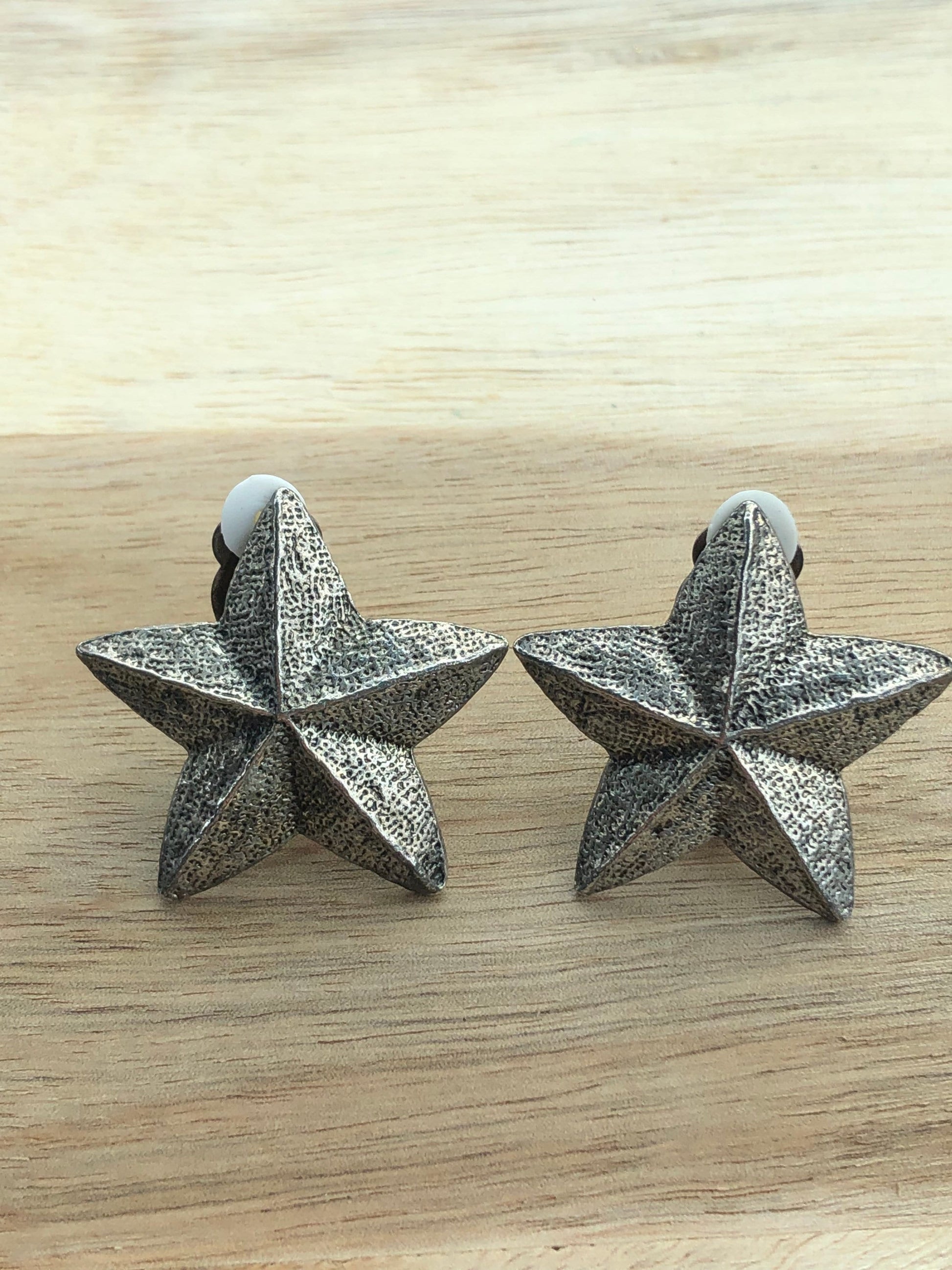 bronze clip on star earrings