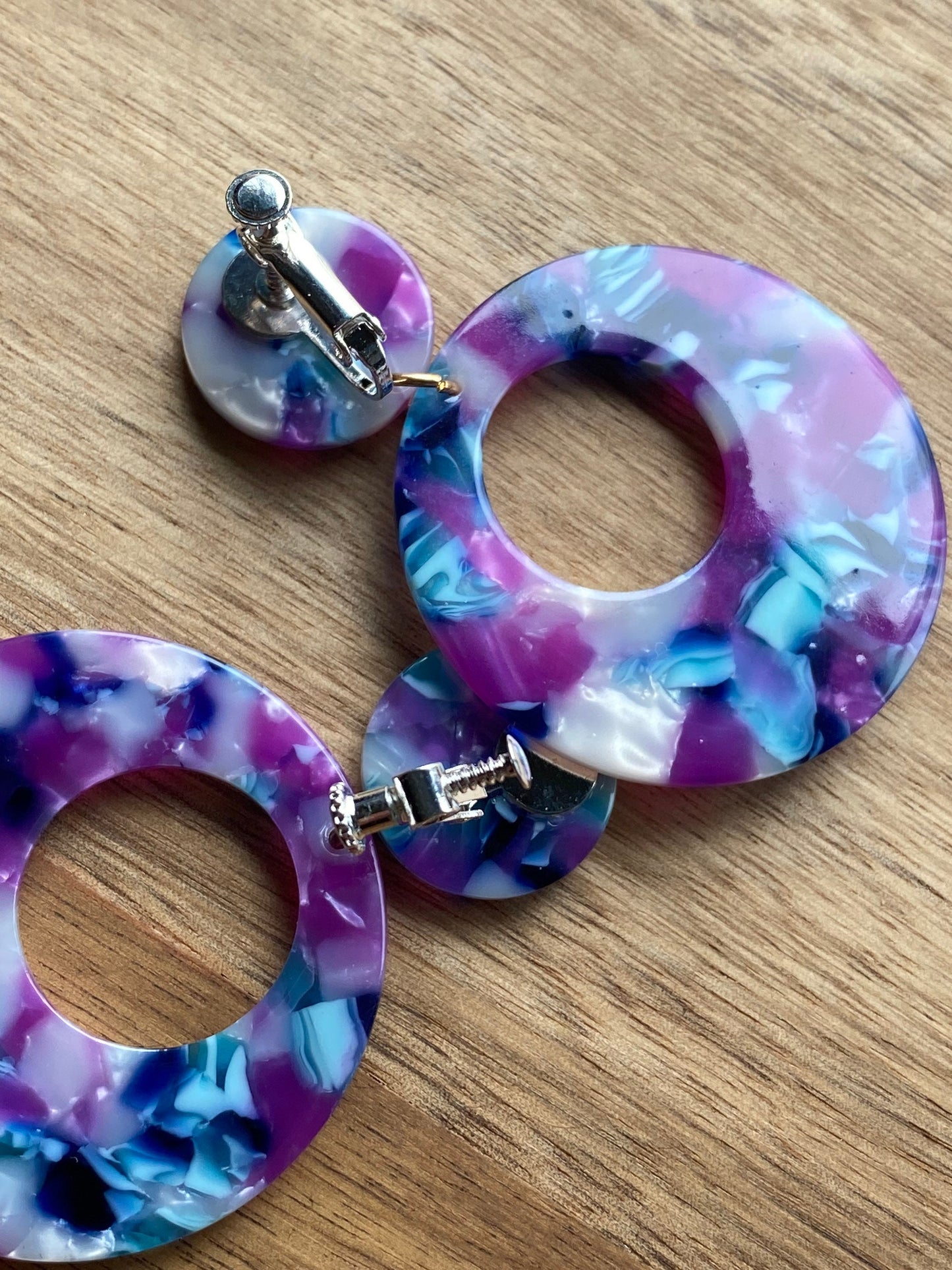 Dangling clip on tortoiseshell hoop earrings, purple, green or pink hoops