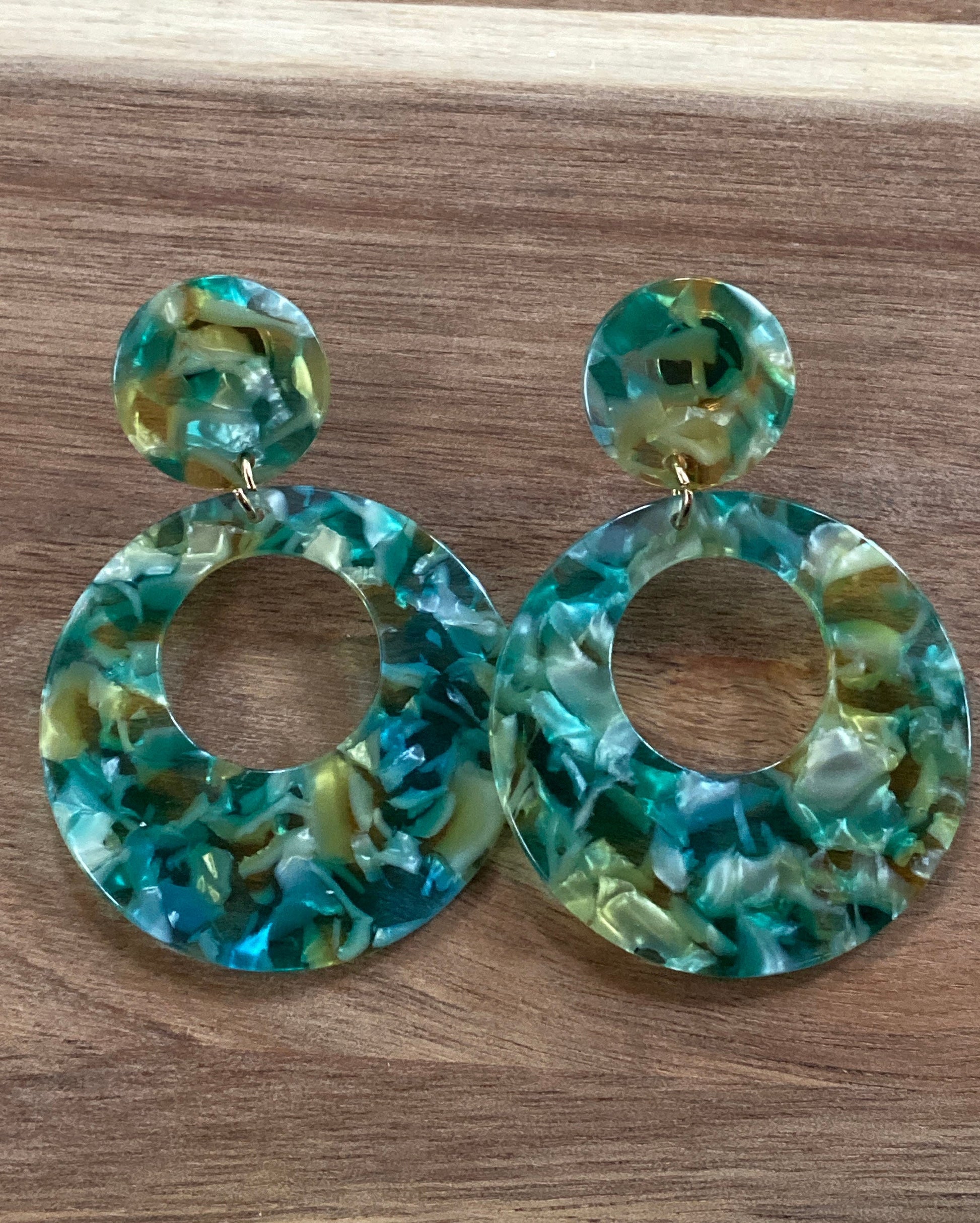 dangling green clip on tortoiseshell hoops