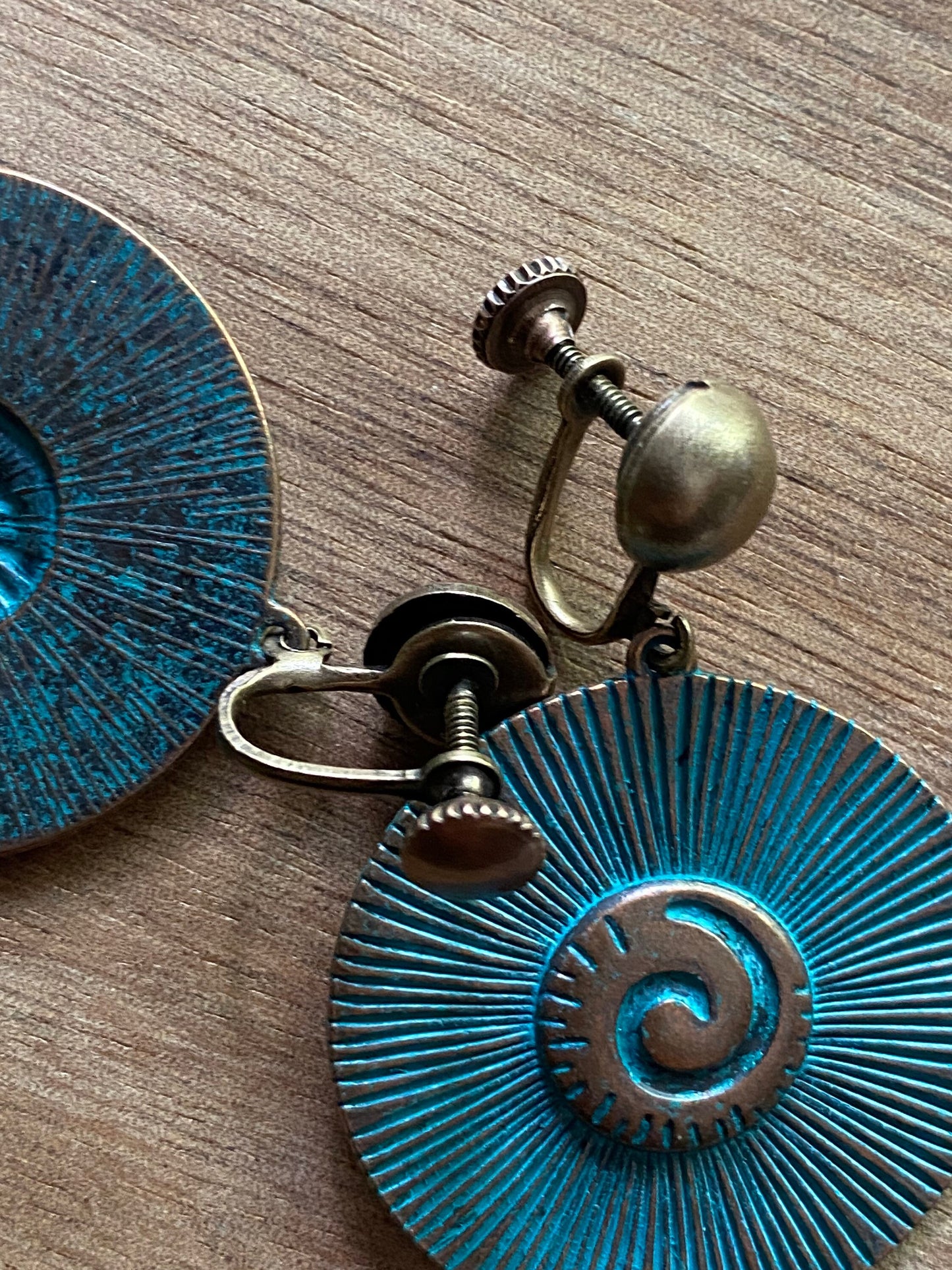 Dangling bronze swirl medallion clip on earrings, screwback earrings