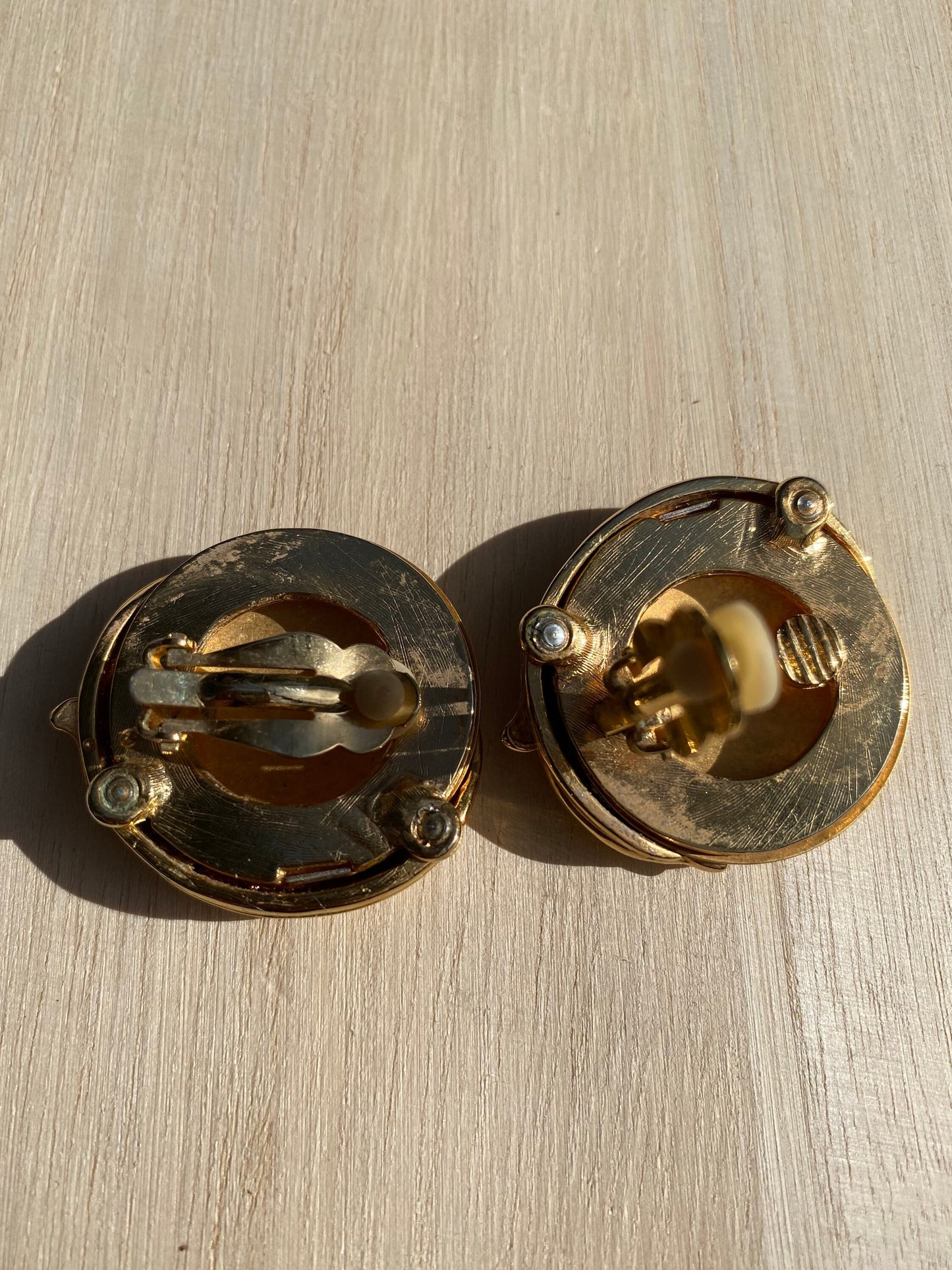 Vintage matte gold clip on button earrings with peacock border | medium neutral gold earrings