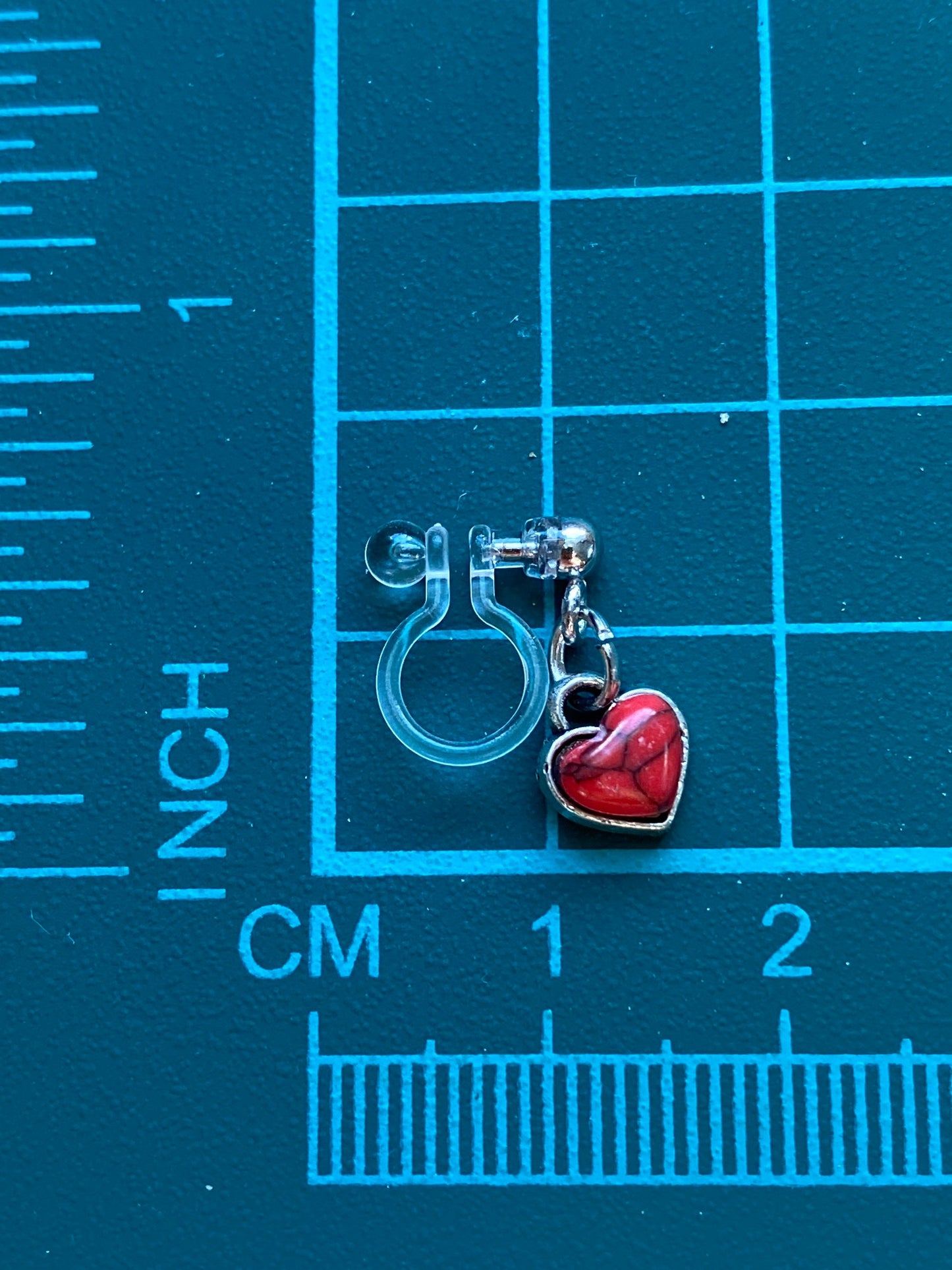 Dangling invisible clip on earrings (no piercing no pierce) with adorable heart pendants