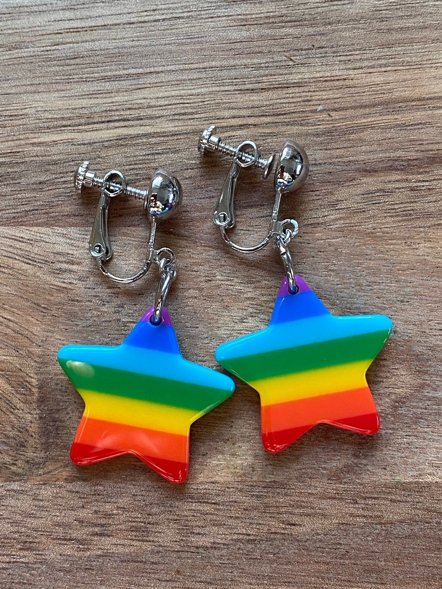 Dangling rainbow star clip on earrings | rainbow earrings | rainbow pride hinged screwback earrings