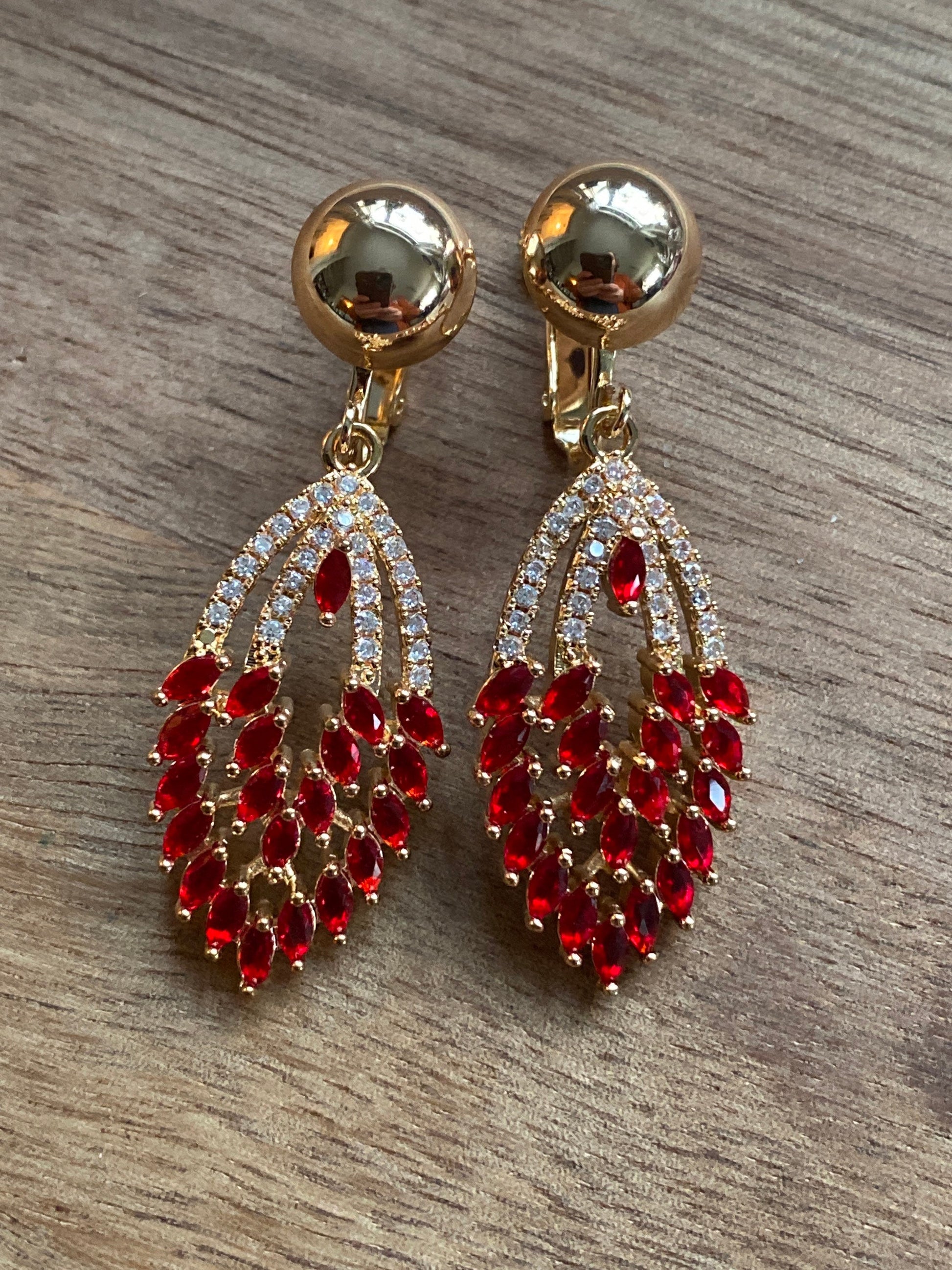 dangling red rhinestone feather clip on earrings