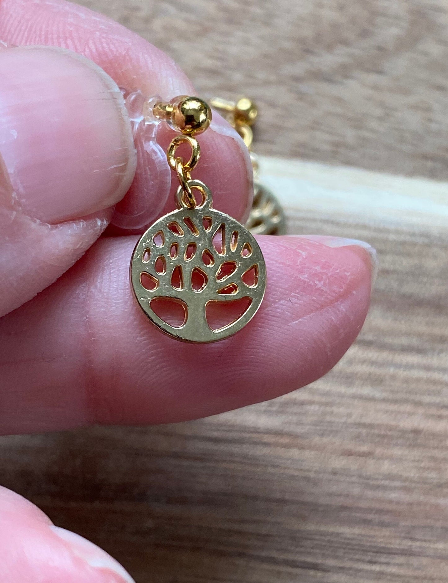 Dangling invisible clip on earrings (no piercing no pierce) with golden tree pendants