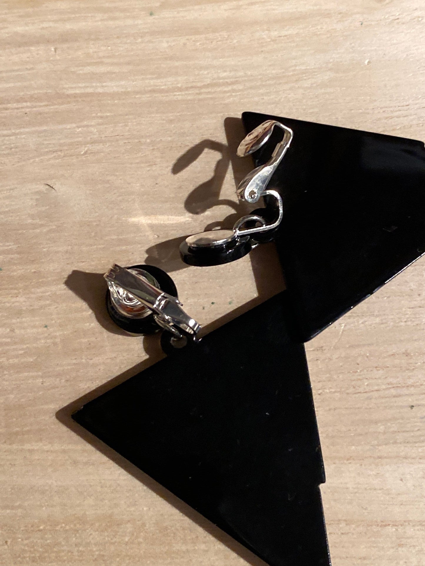 Asymmetrical retro dangling black and white plastic triangle clip on earrings