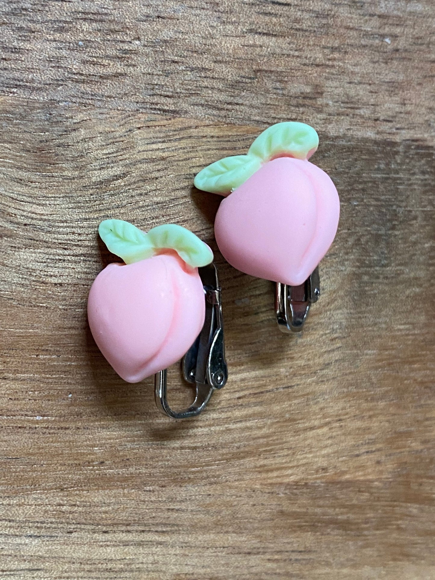 tiny peach clip on earrings