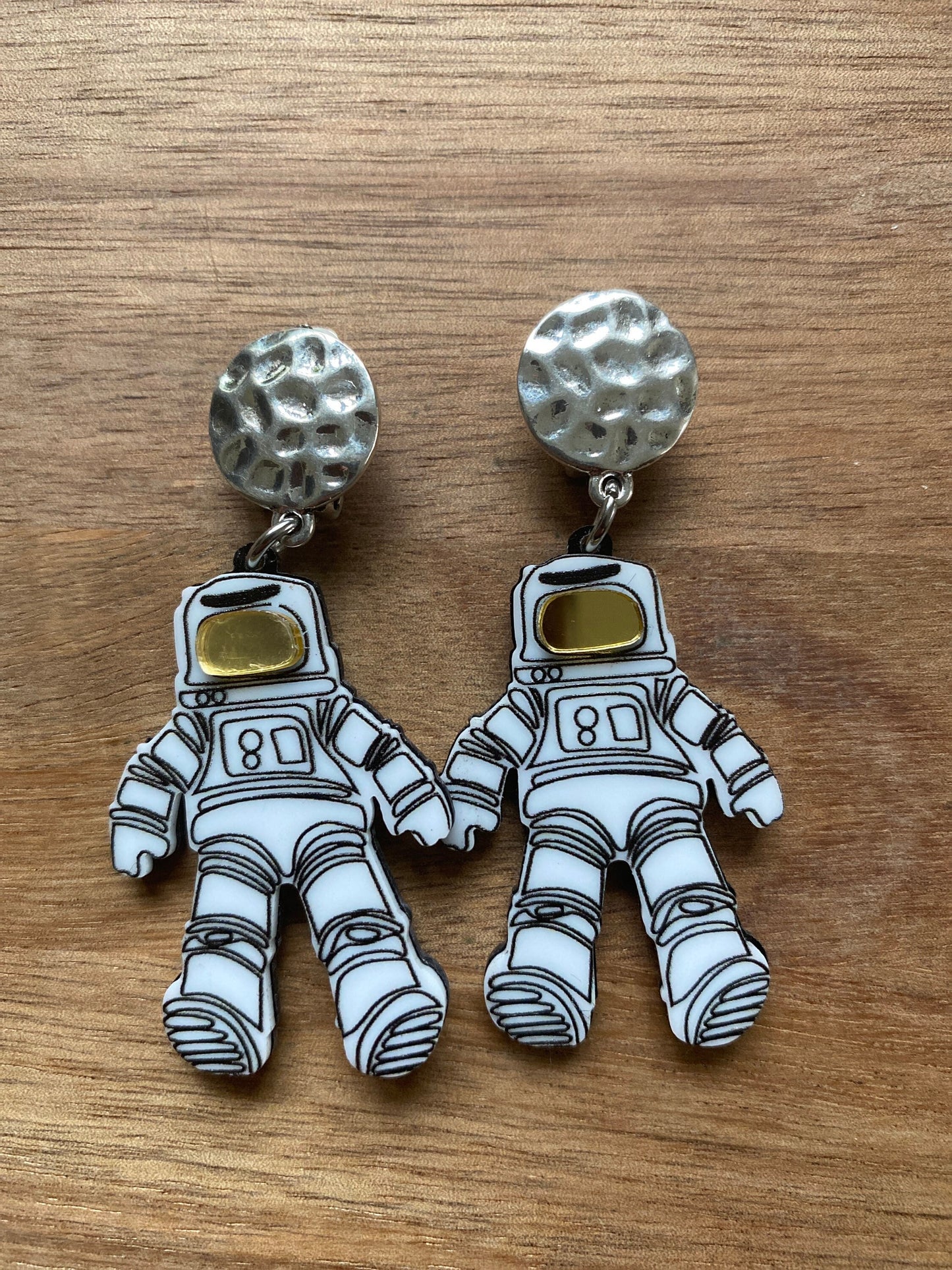 Dangling astronaut clip on earrings, outer space earrings