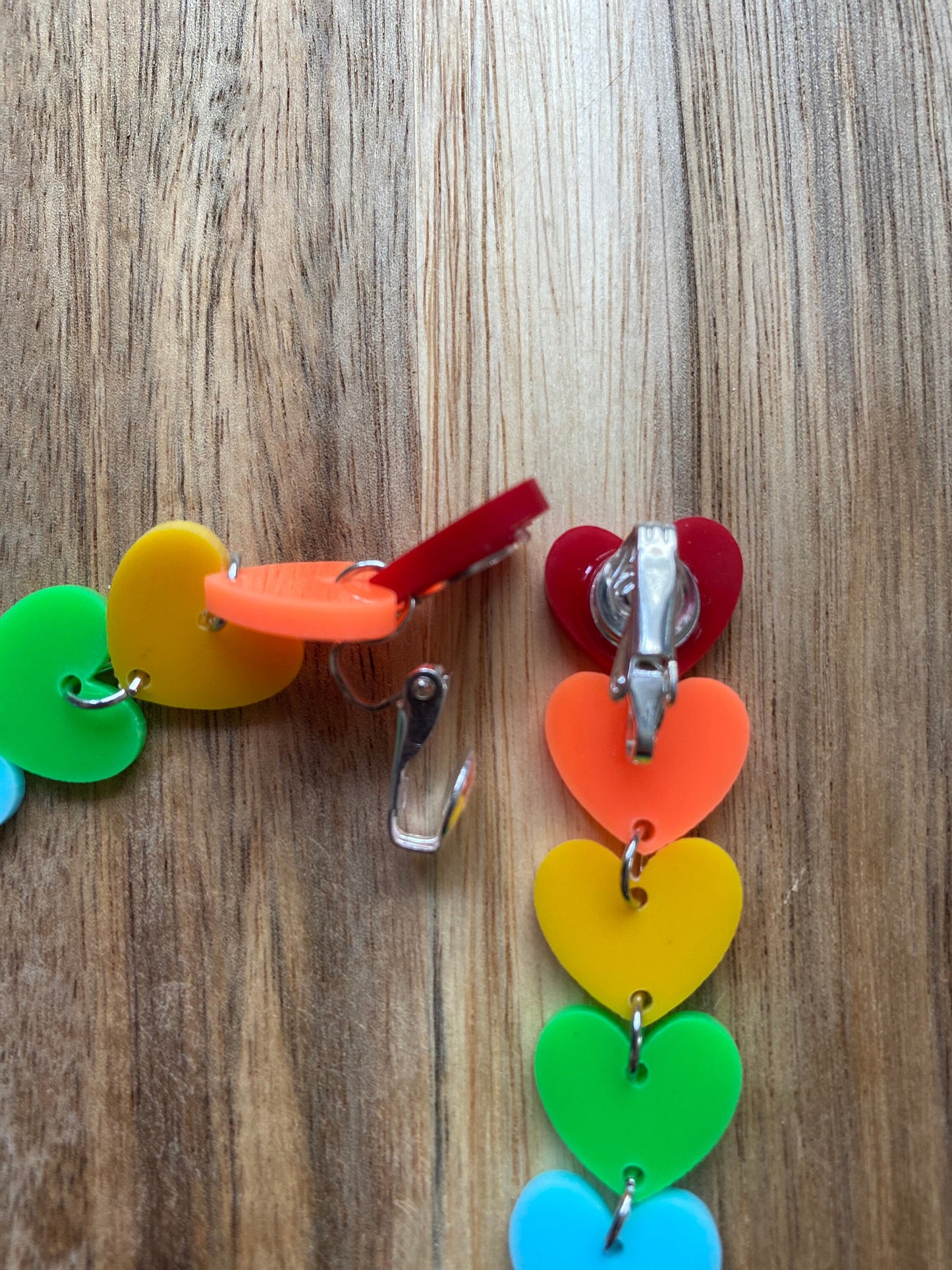 Dangling clip on rainbow heart earrings, pride earrings, fun earrings