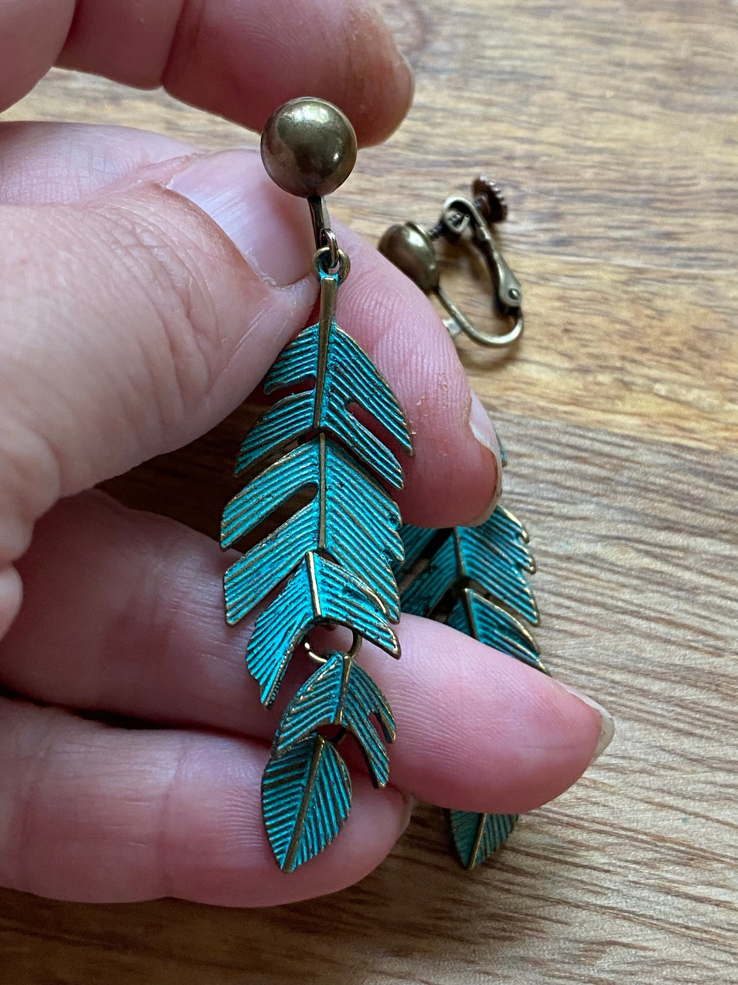 Dangling clip on bronze feather or leaf earrings, articulated feather clip on earrings, antique patina earrings