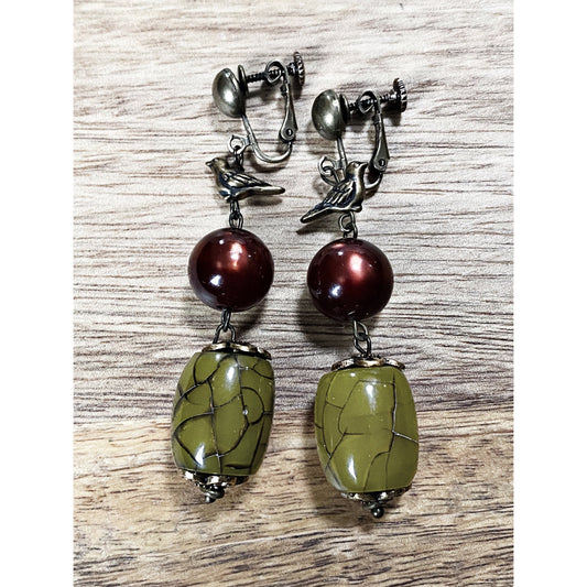 Gorgeous dangling  beaded clip on earrings, green and red beads with bronze bird accent, screwback bird earrings, ooak