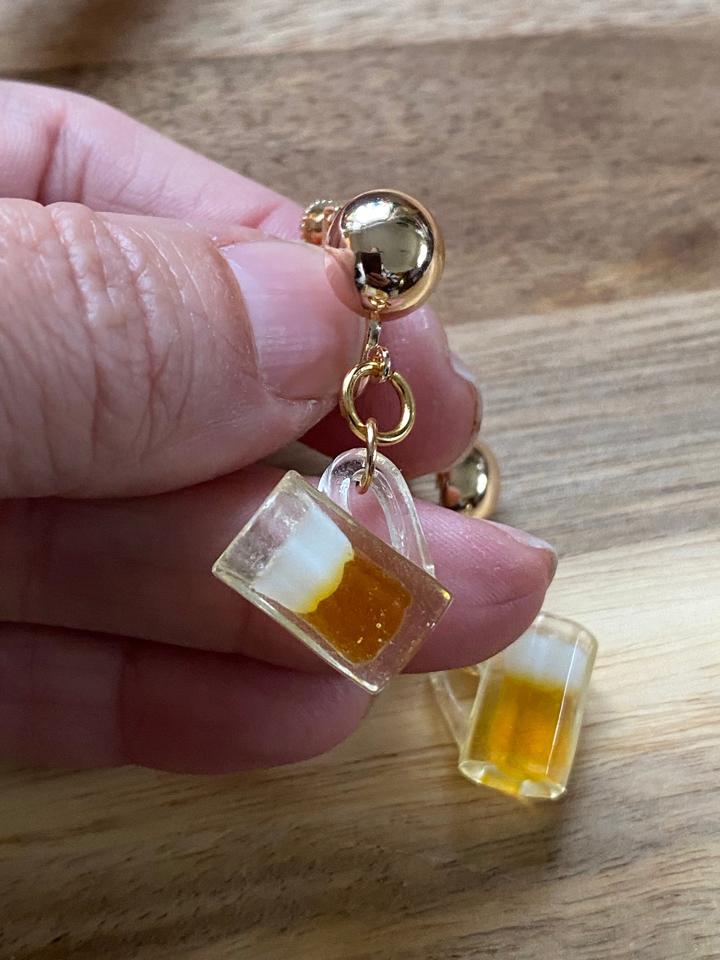 Dangling 3D frothy pint beer clip on earrings (screwback)