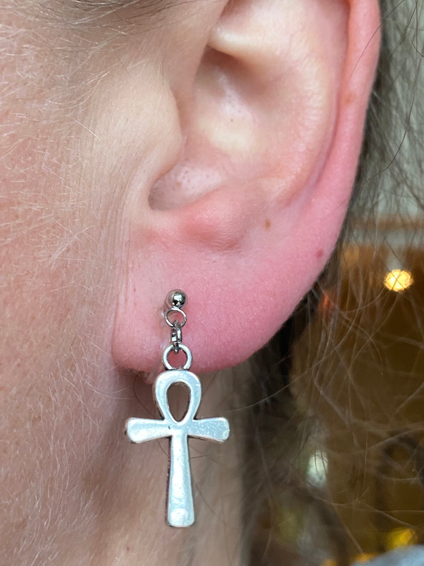 Dangling ankh invisible clip on earrings, silver symbol earrings on plastic closures