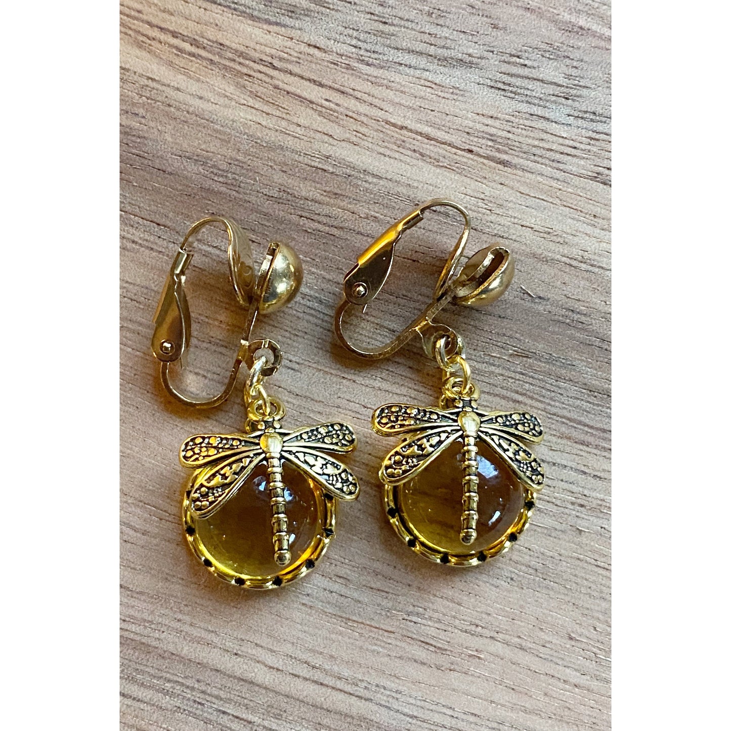 Dangling golden dragonfly clip on earrings,  hinged glass boho dragonflies