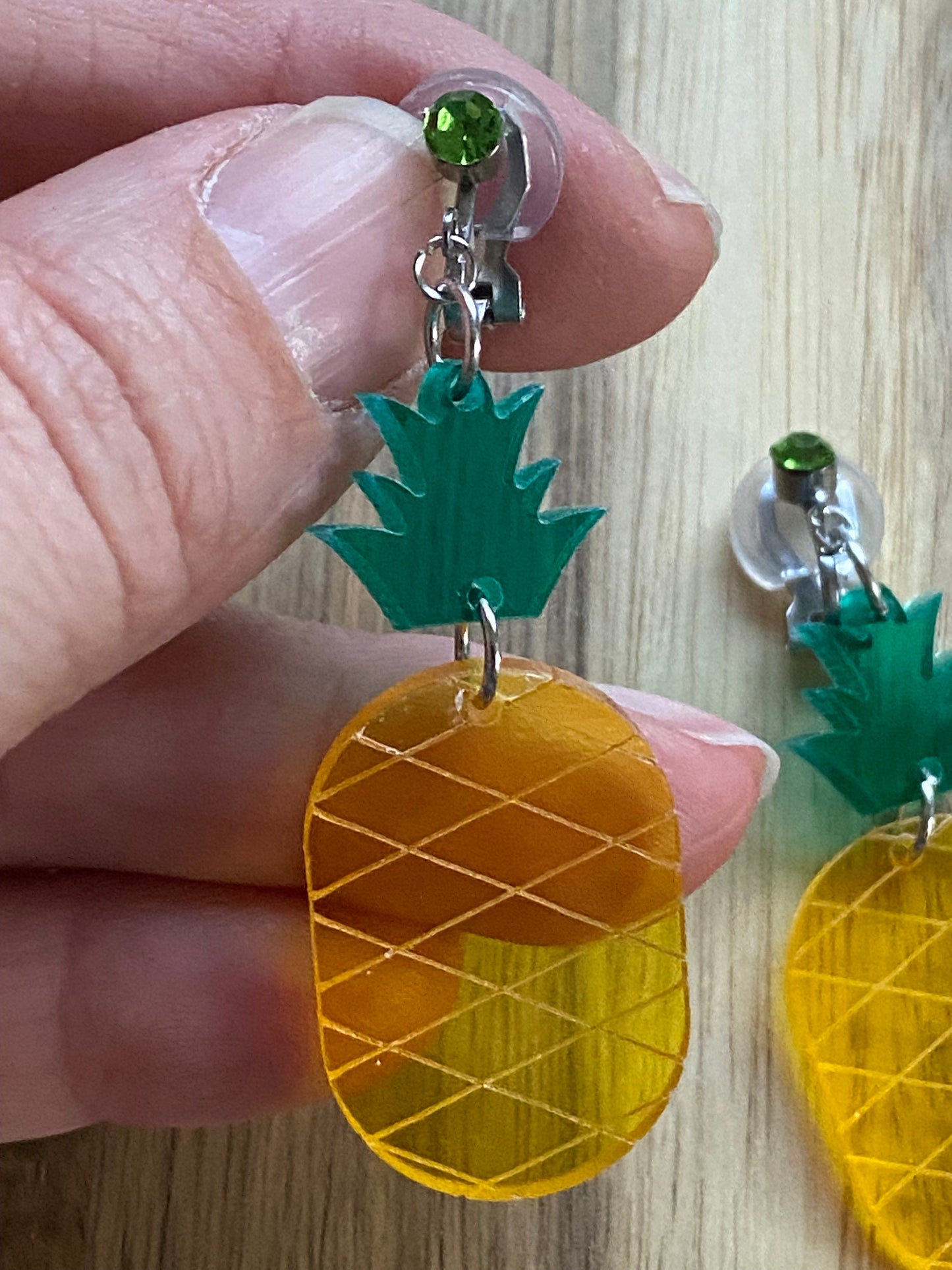 Dangling translucent pineapple clip on earrings