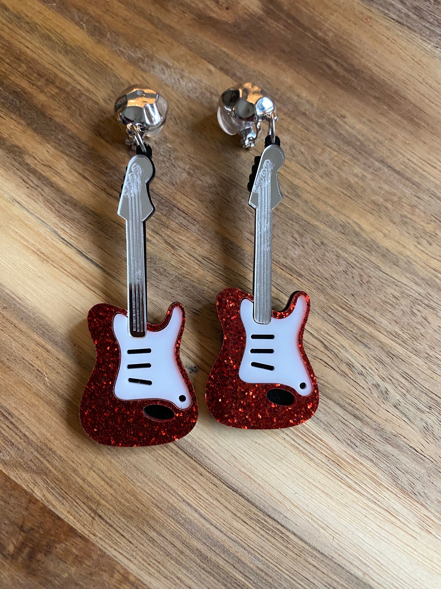 Dangling oversized glitter electric guitar clip on earrings, plastic musical instrument clip on earrings