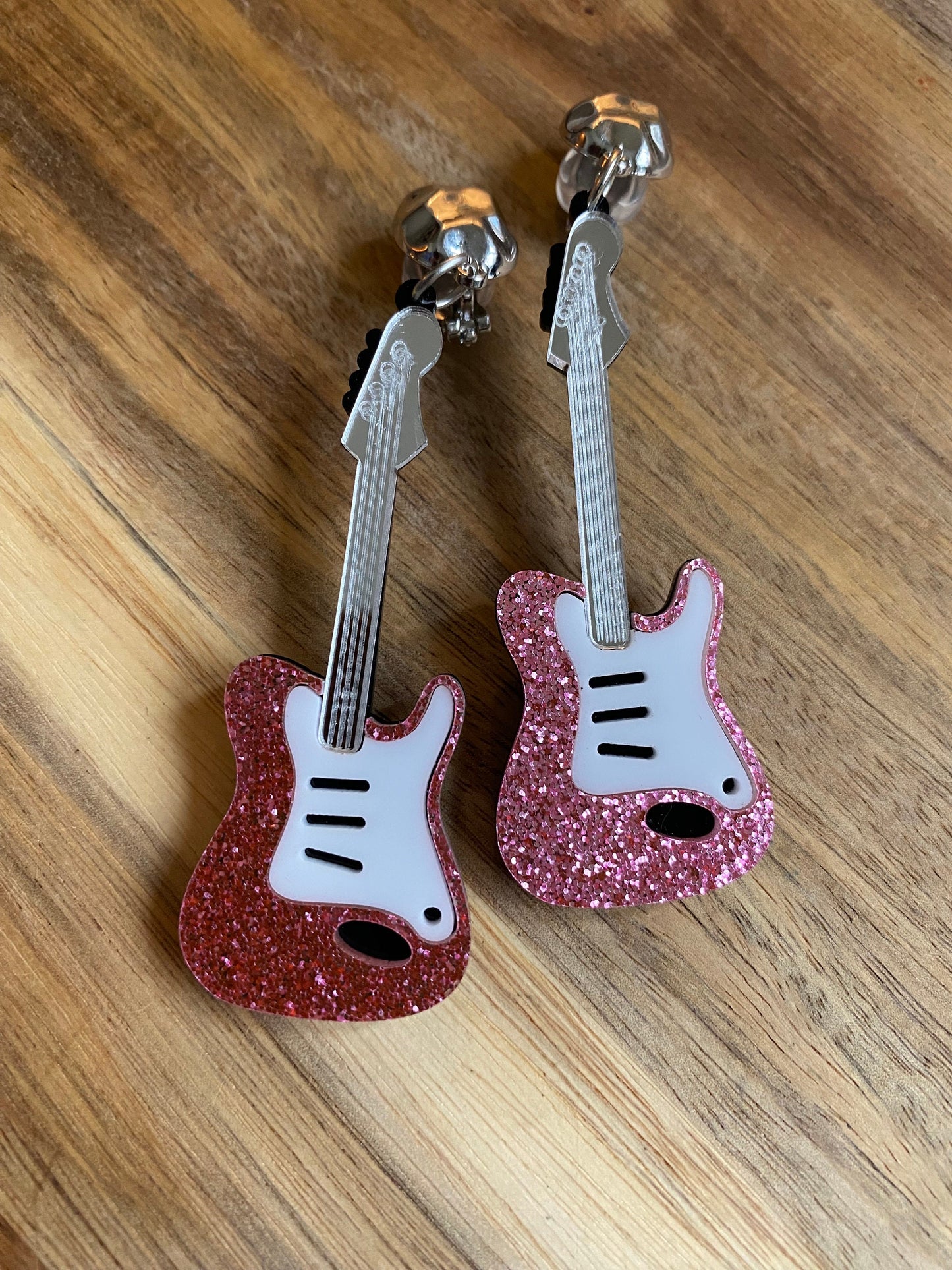 Dangling oversized glitter electric guitar clip on earrings, plastic musical instrument clip on earrings