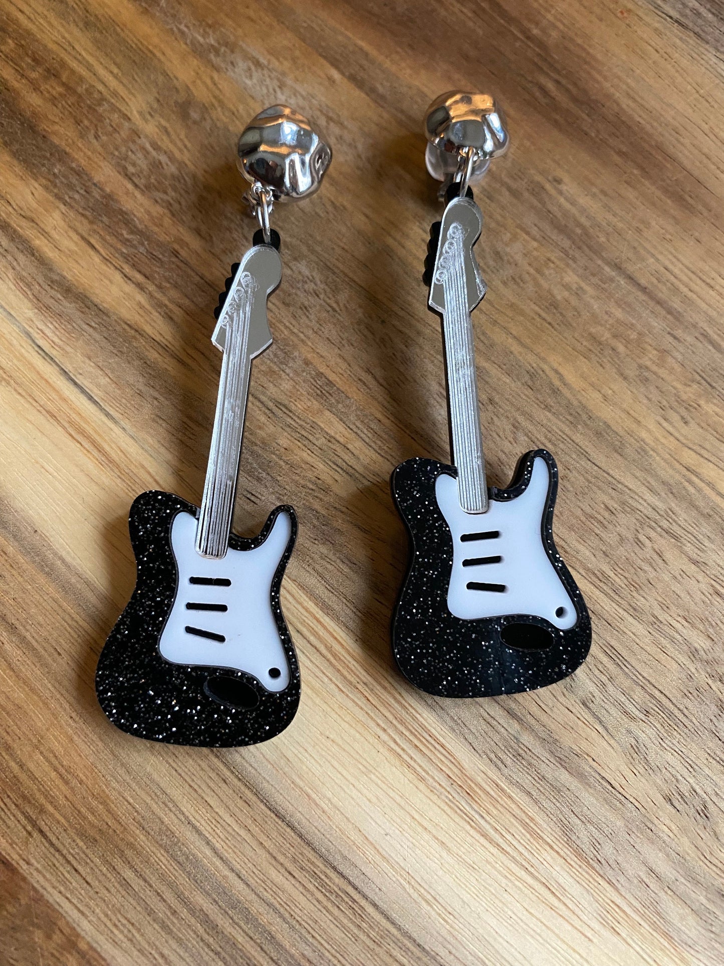 Dangling oversized glitter electric guitar clip on earrings, plastic musical instrument clip on earrings