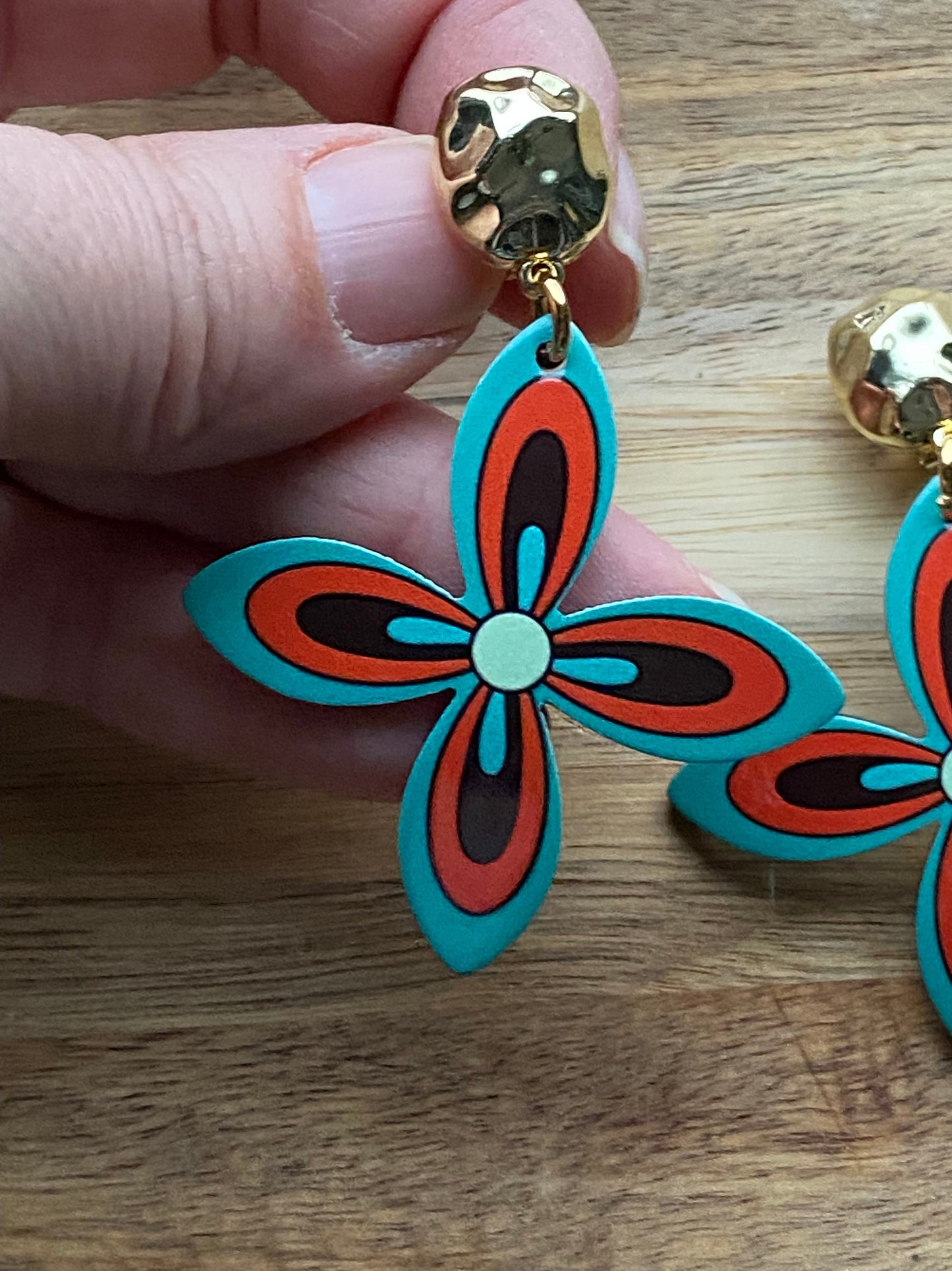 Dangling clip on earrings turquoise and orange flowers