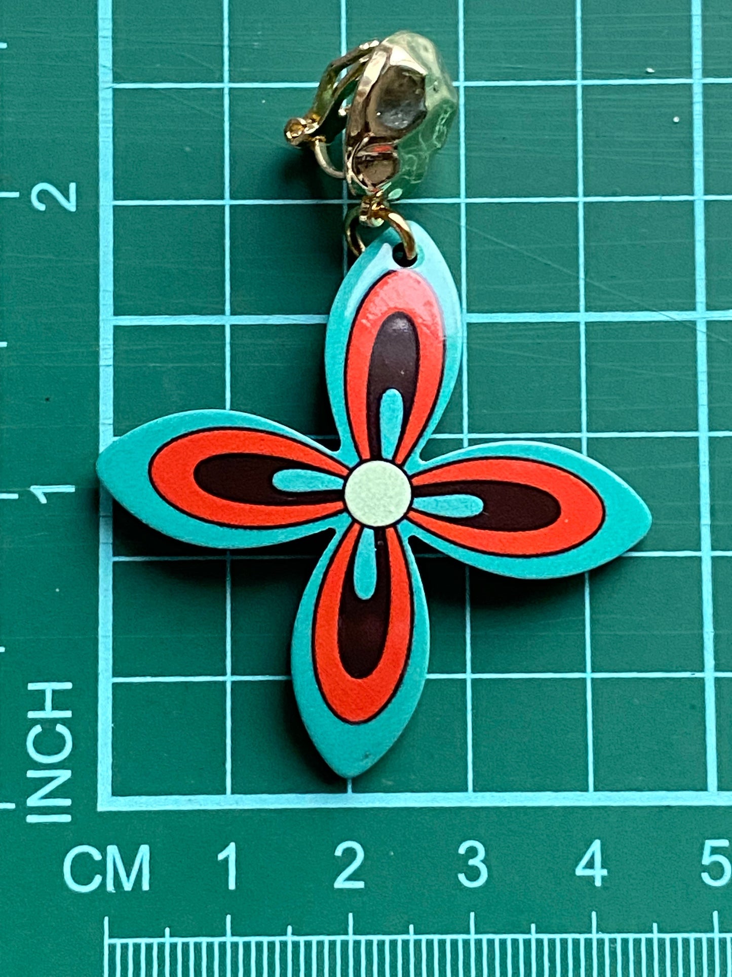 Dangling clip on earrings turquoise and orange flowers