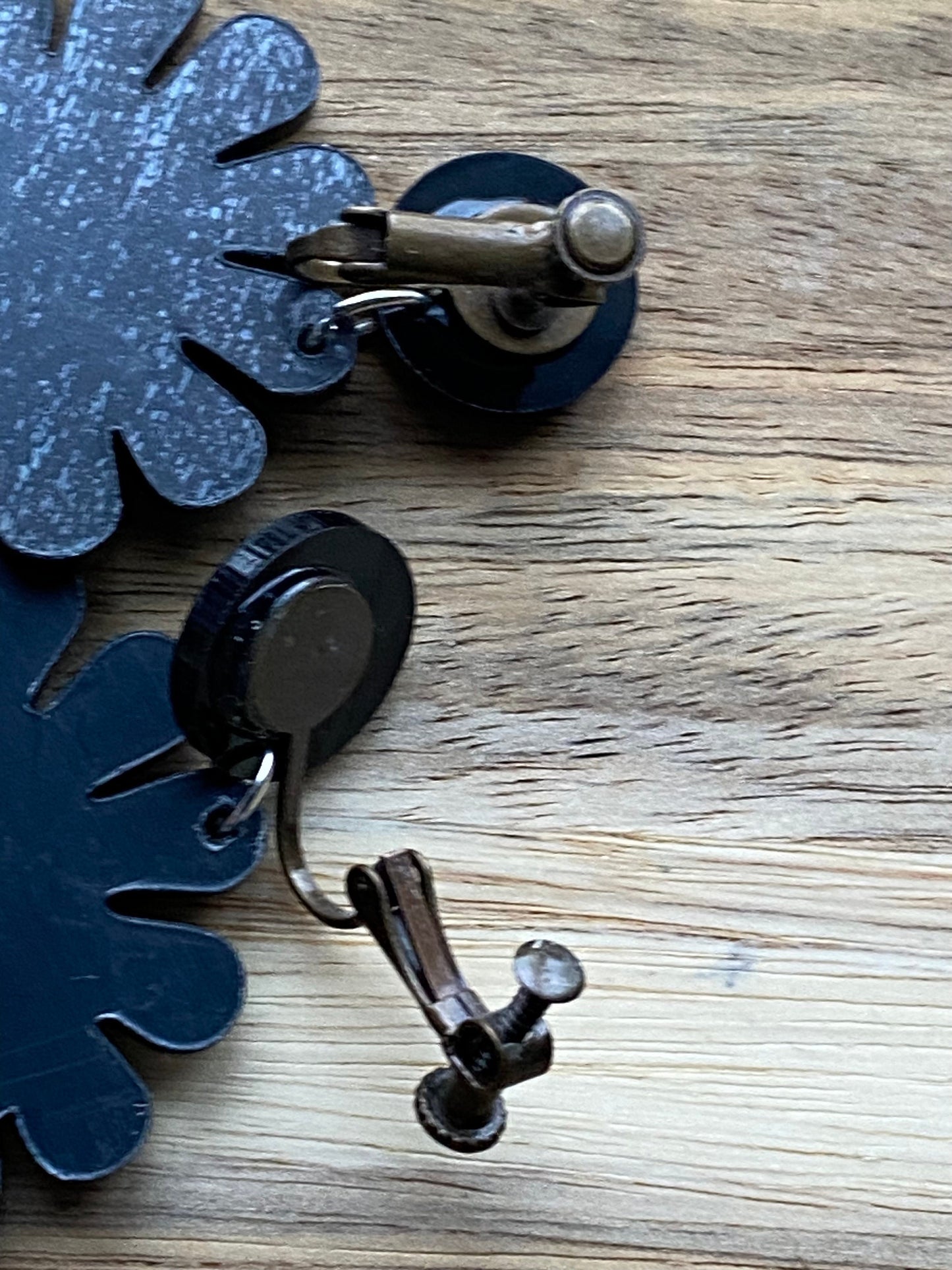 Dangling clip on earrings, Halloween black and orange daisies