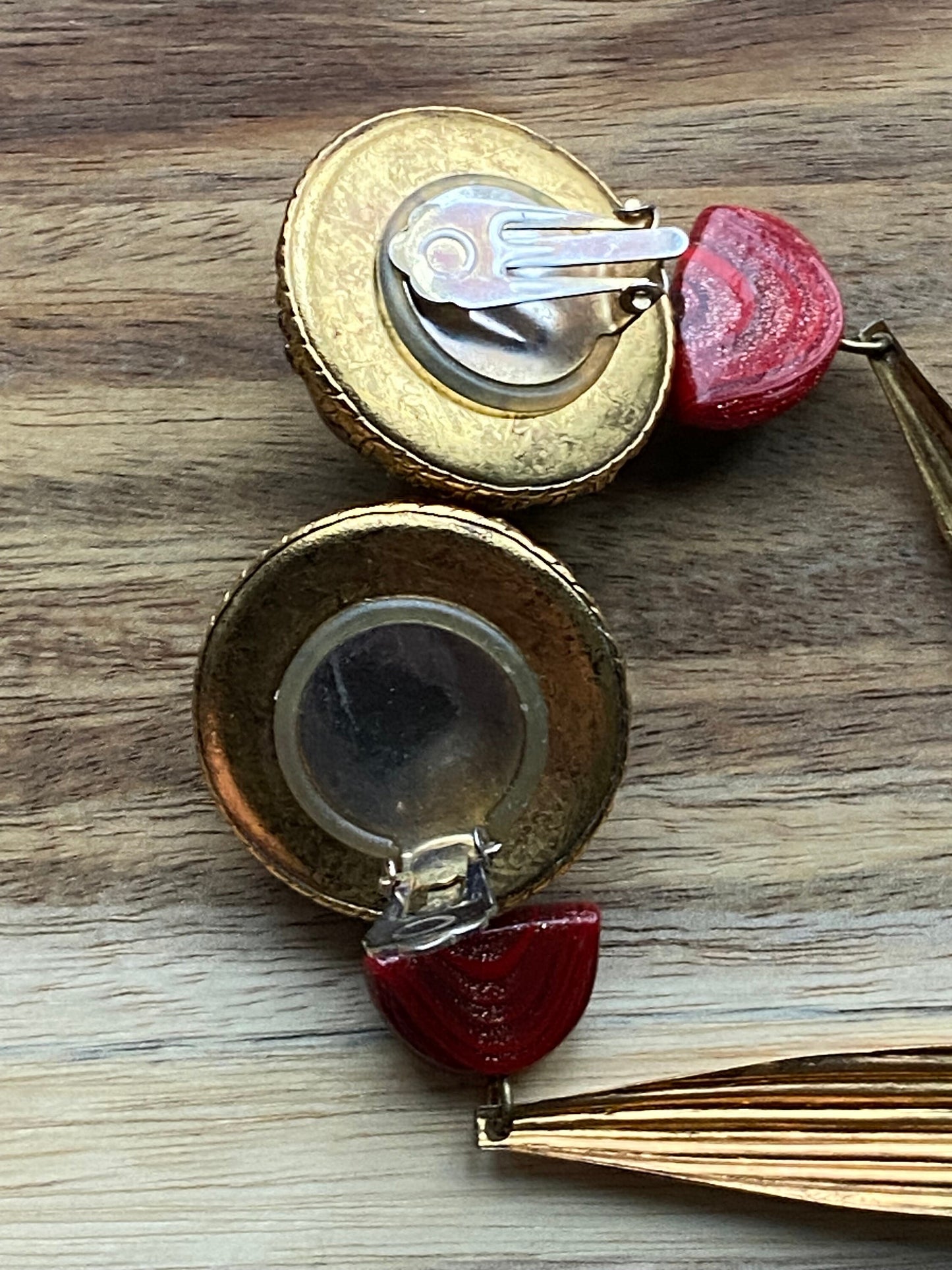 Queen size vintage clip on earrings with large red cabochons and and black dangling pendants