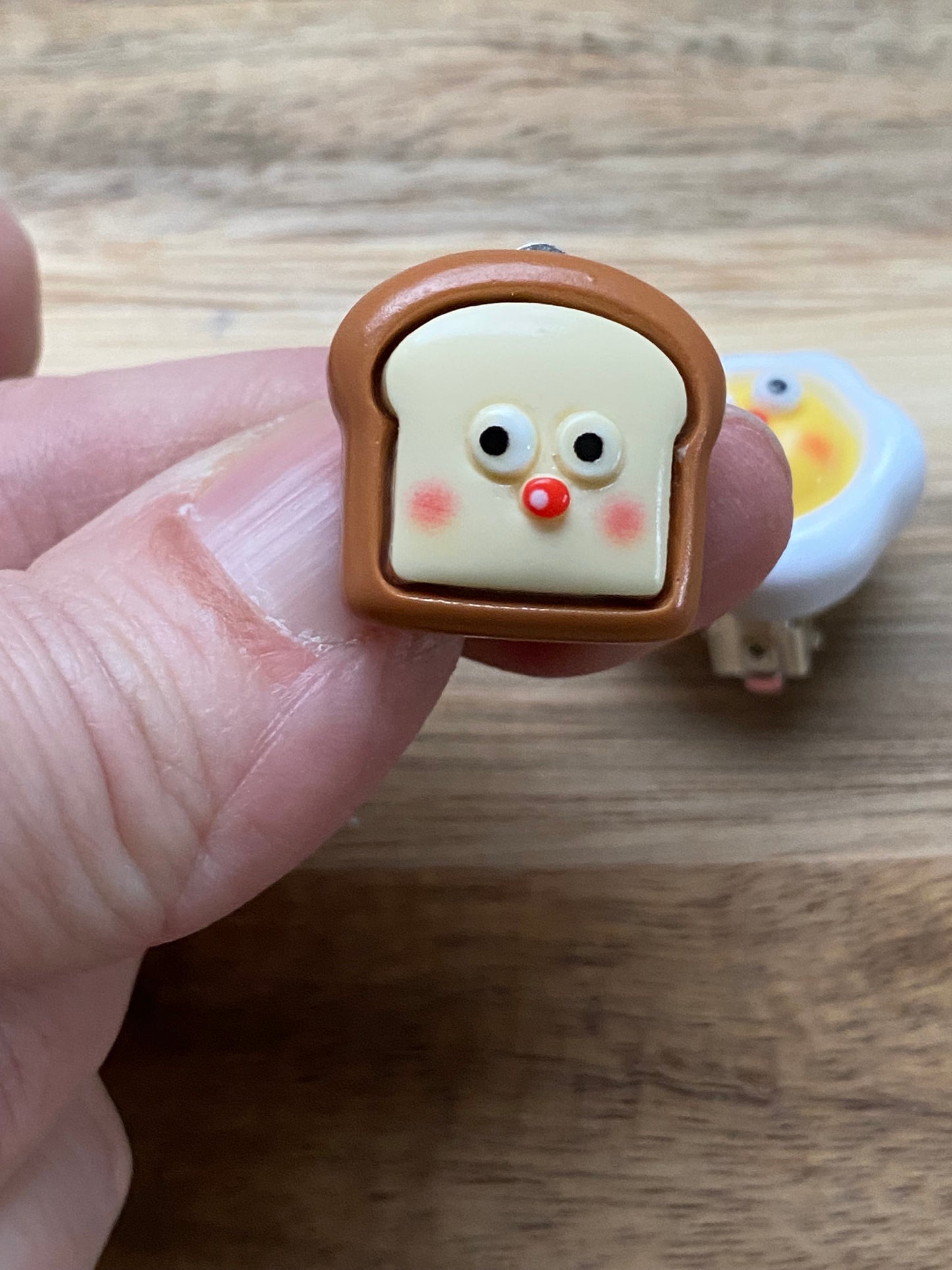 Asymmetrical breakfast clip on earrings, kawaii  eggs and toast with clip closures.