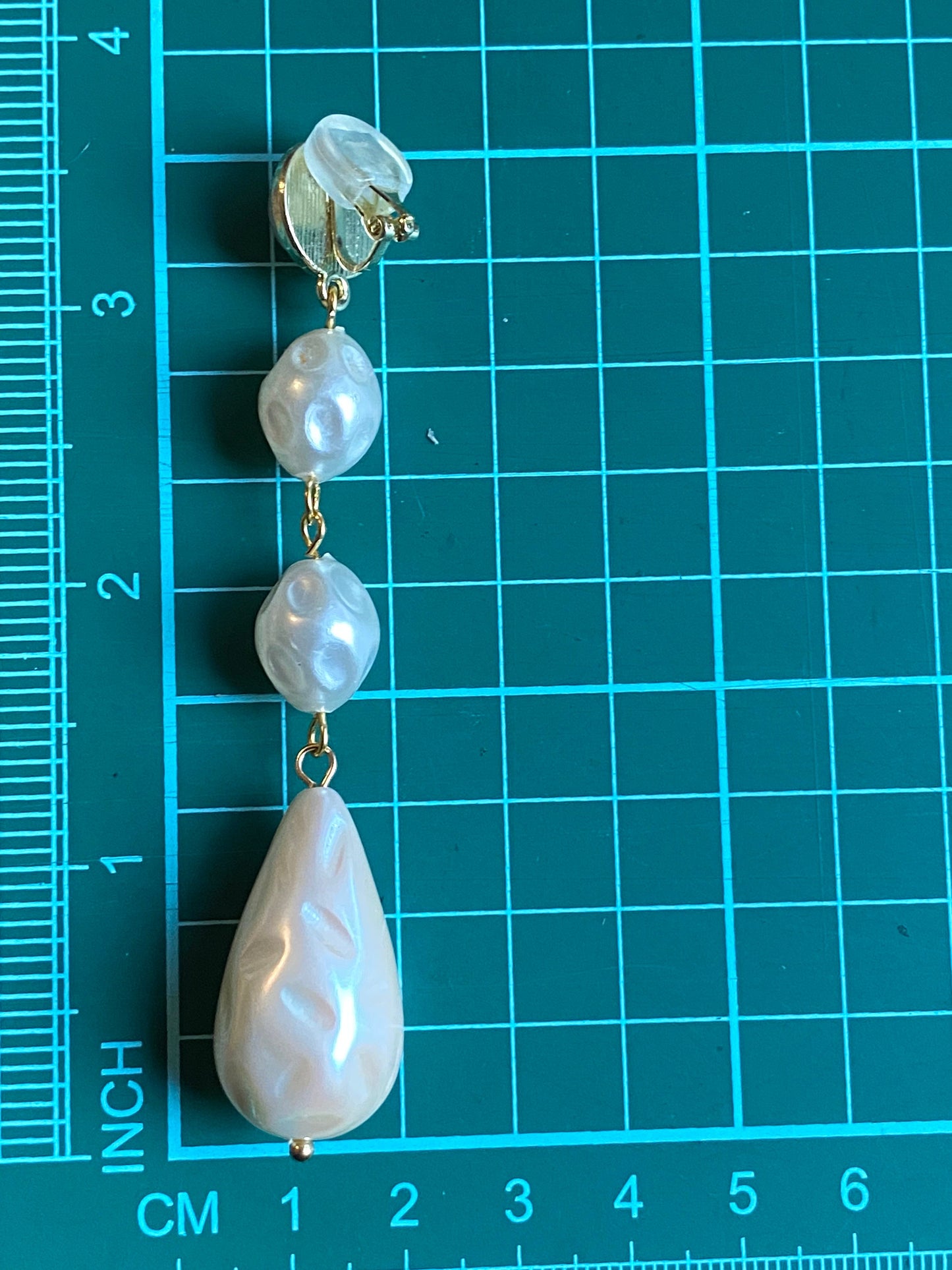 Dangling clip on chunky faux pearl earrings