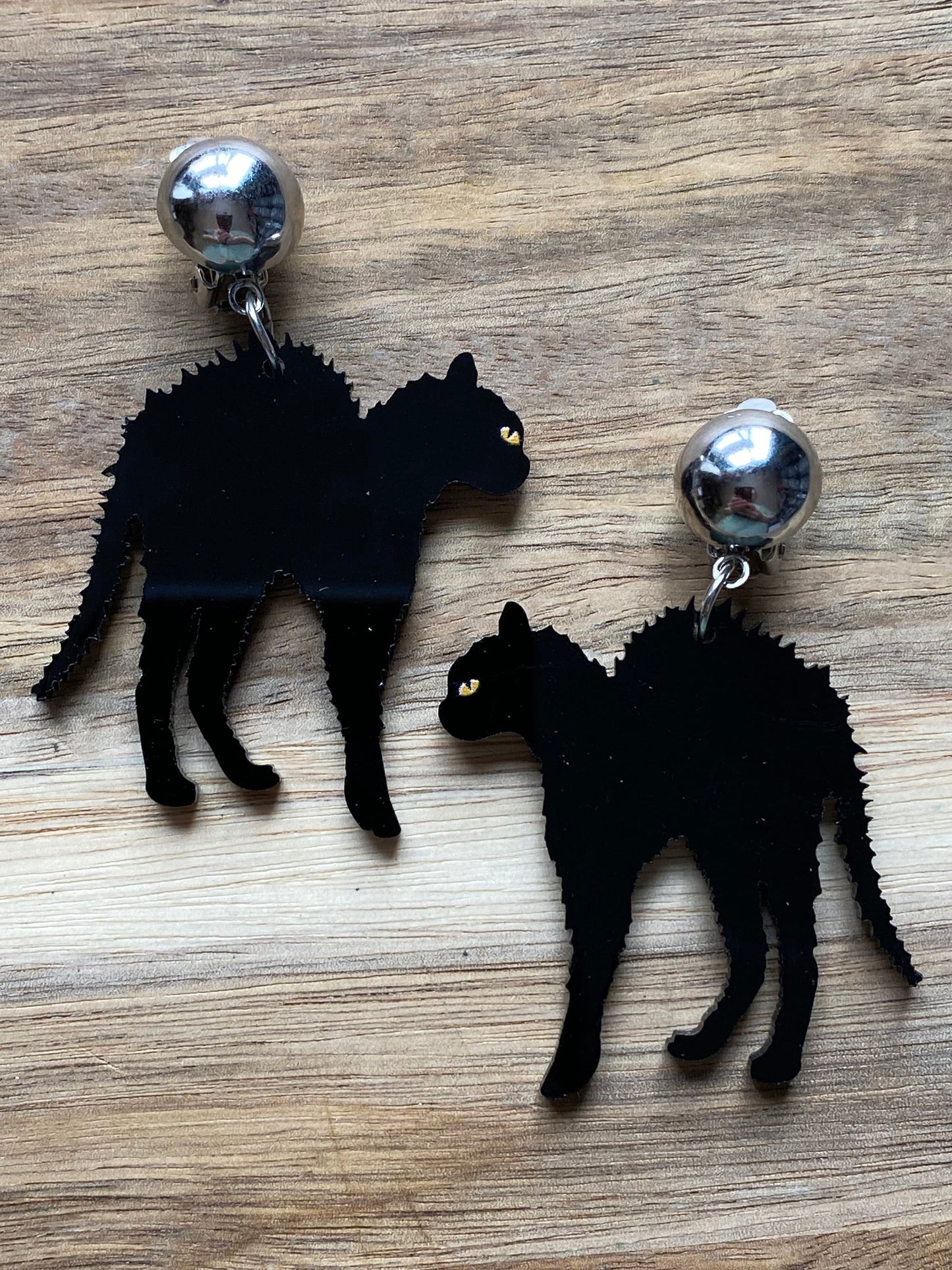 Dangling plastic black cat Halloween clip on earrings