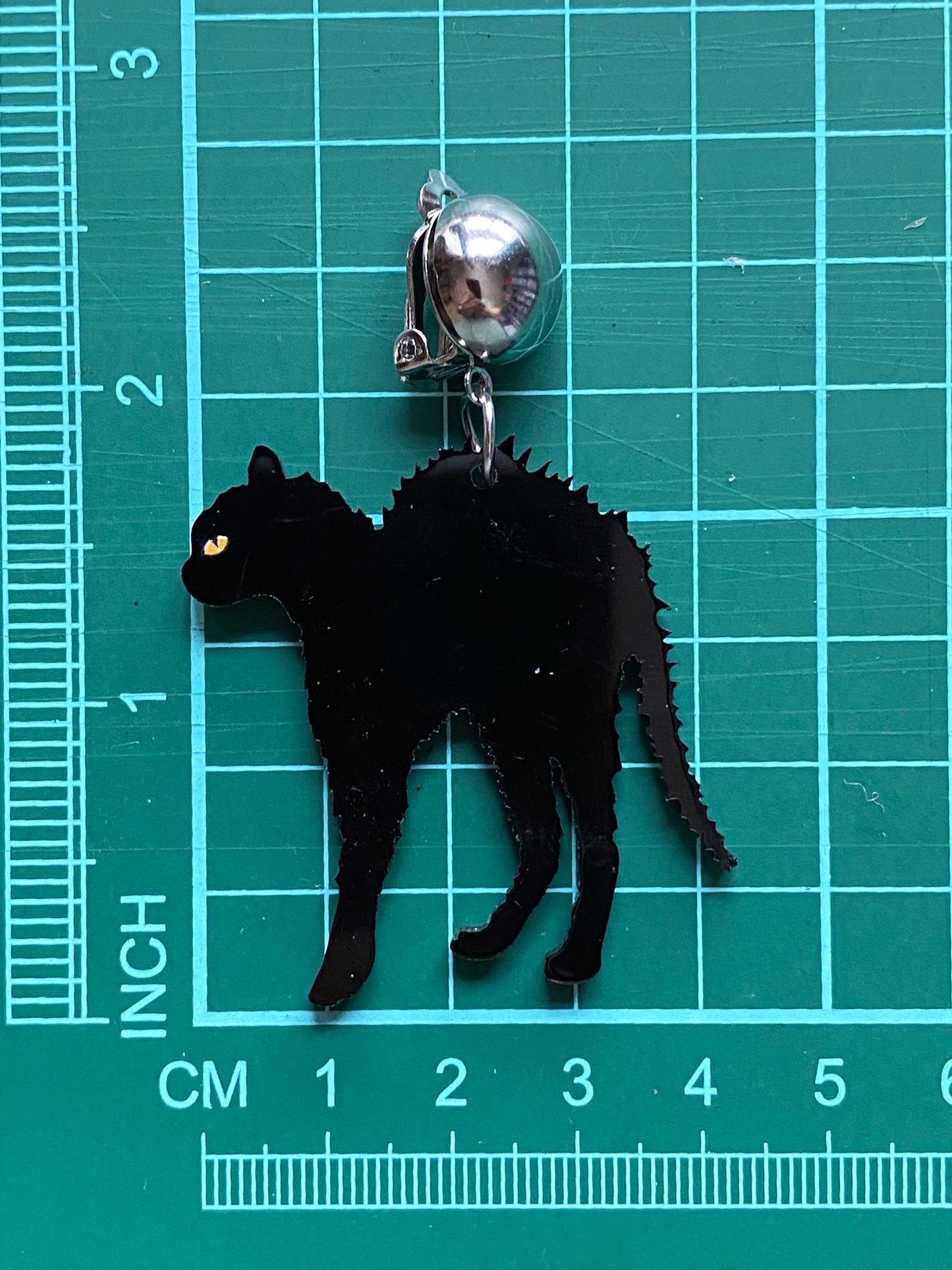 Dangling plastic black cat Halloween clip on earrings