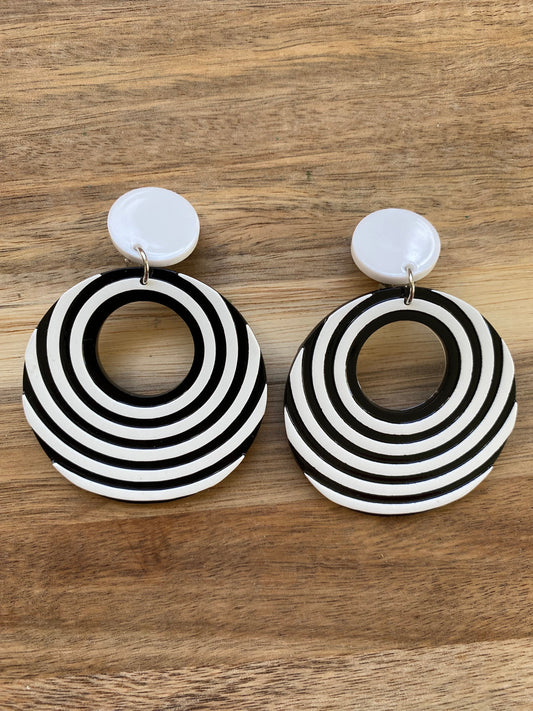 Gorgeous clip on dangling black and white plastic hoop earrings, striped hoops